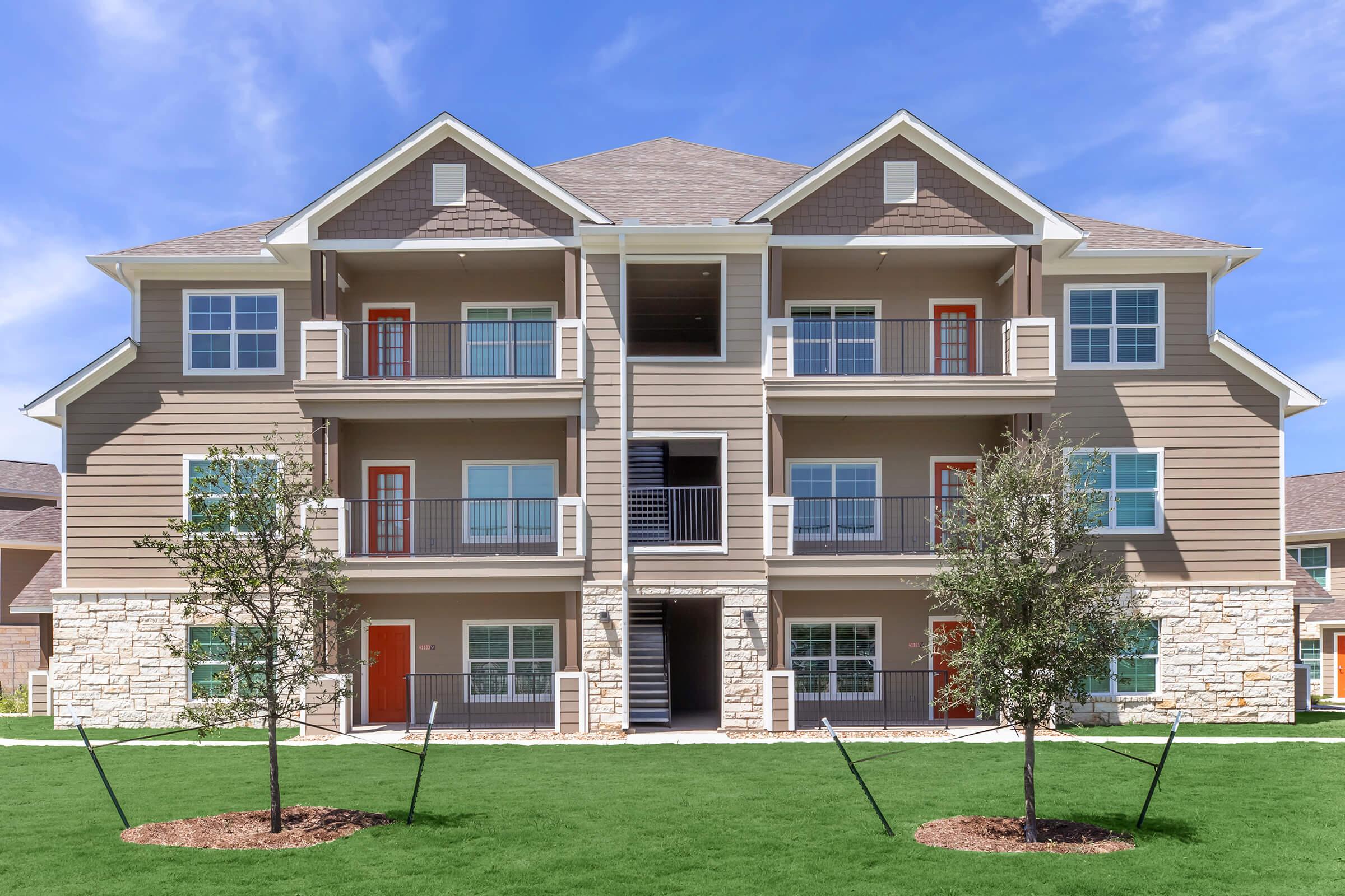 a large lawn in front of a house