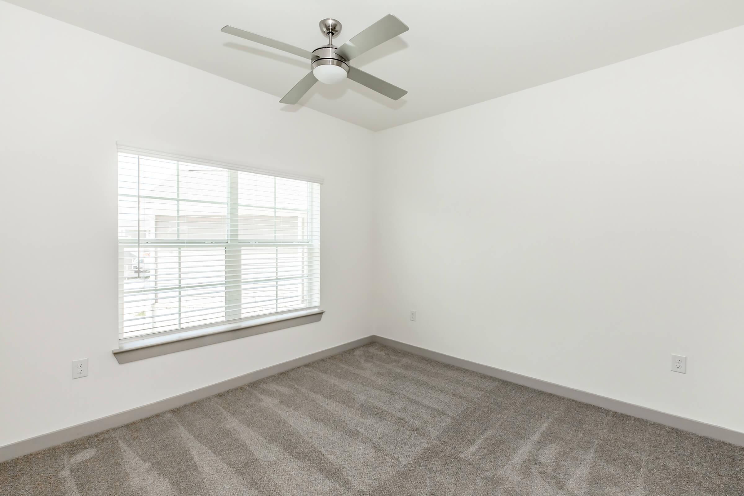 a room with a sink and a window