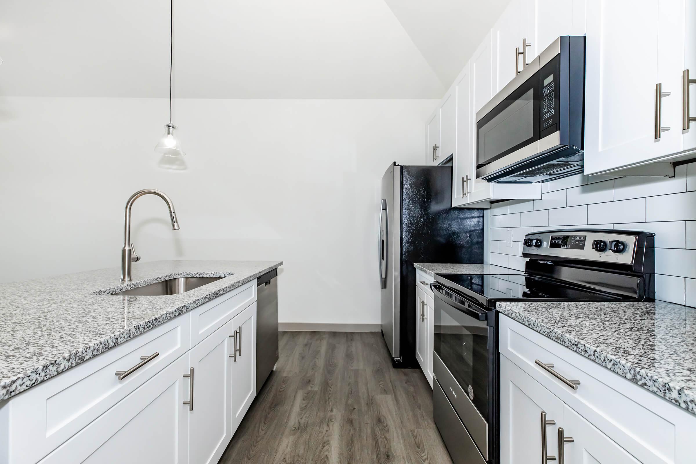 a kitchen with stainless steel appliances