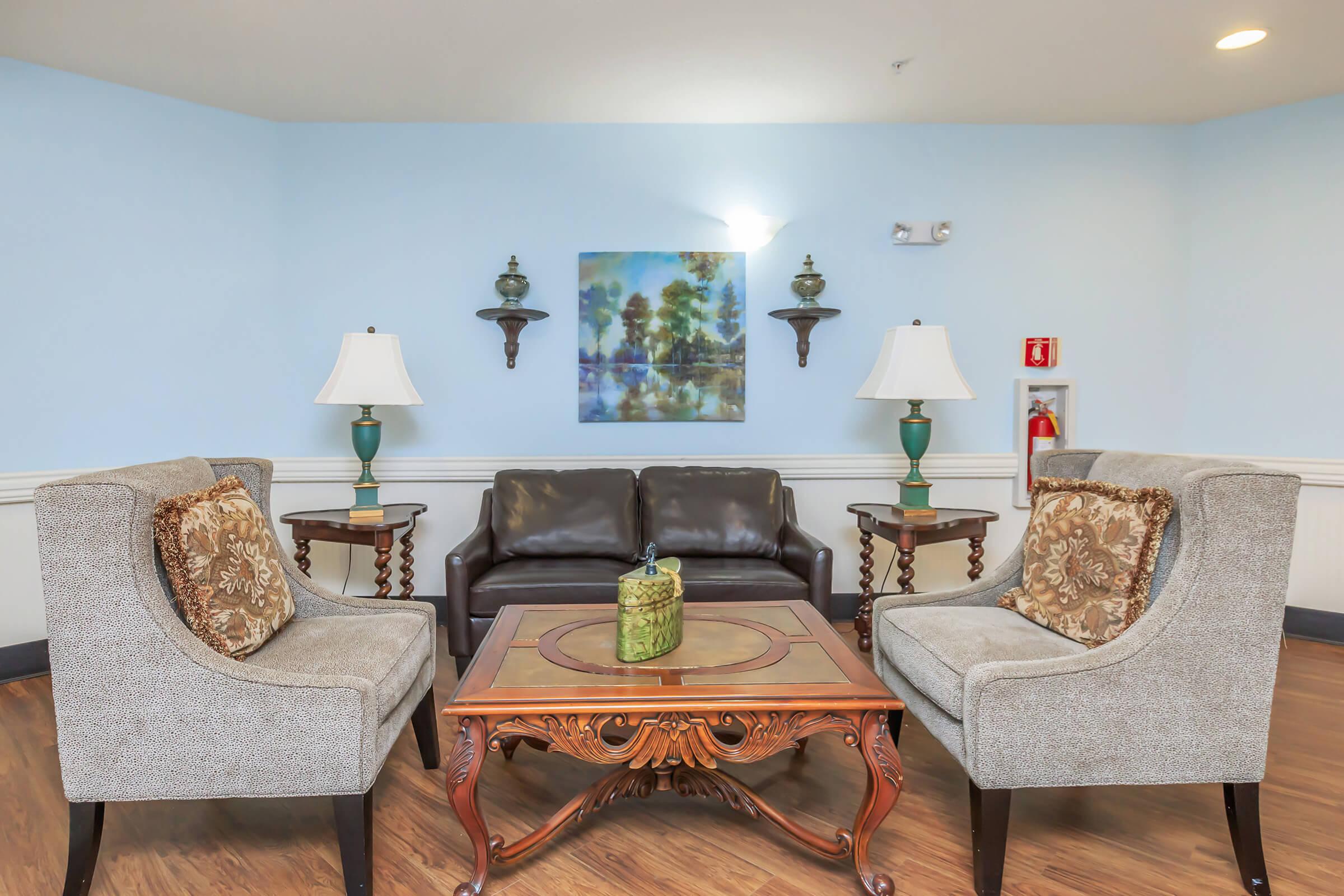 a living room filled with furniture and a fire place