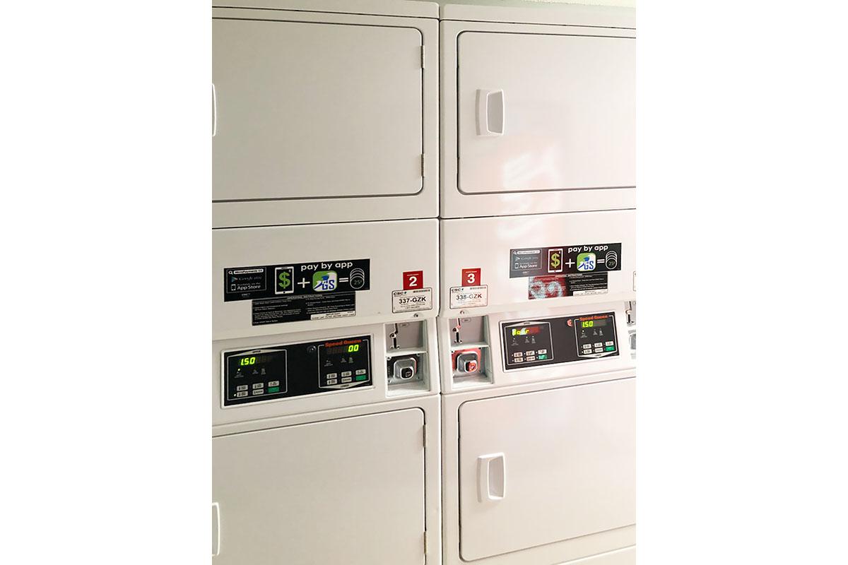 a white refrigerator freezer sitting inside of a kitchen