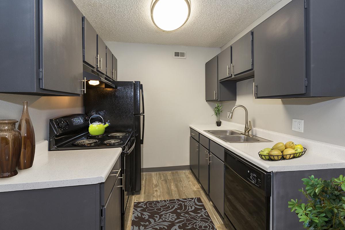 a modern kitchen with stainless steel appliances