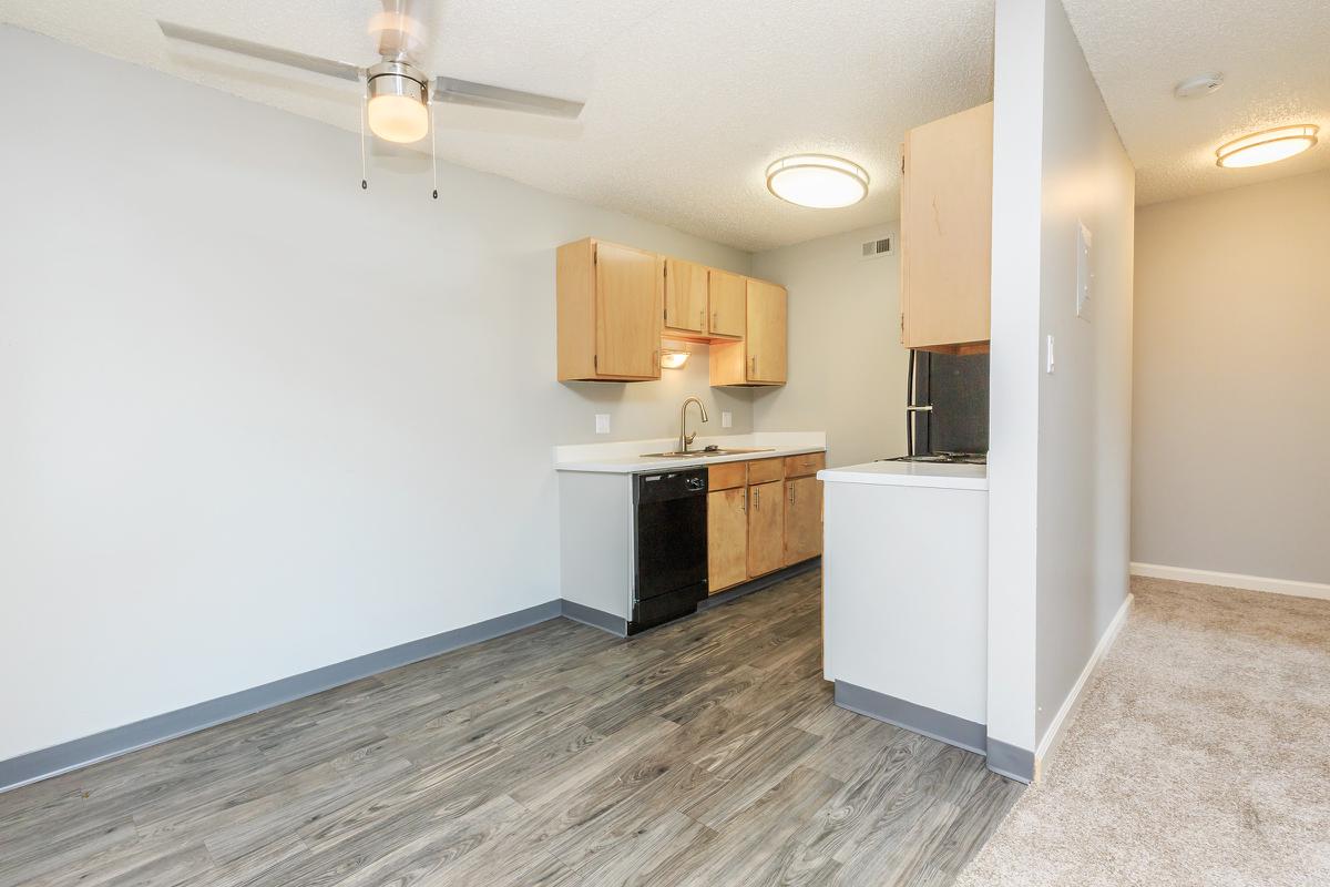 a kitchen with a wood floor