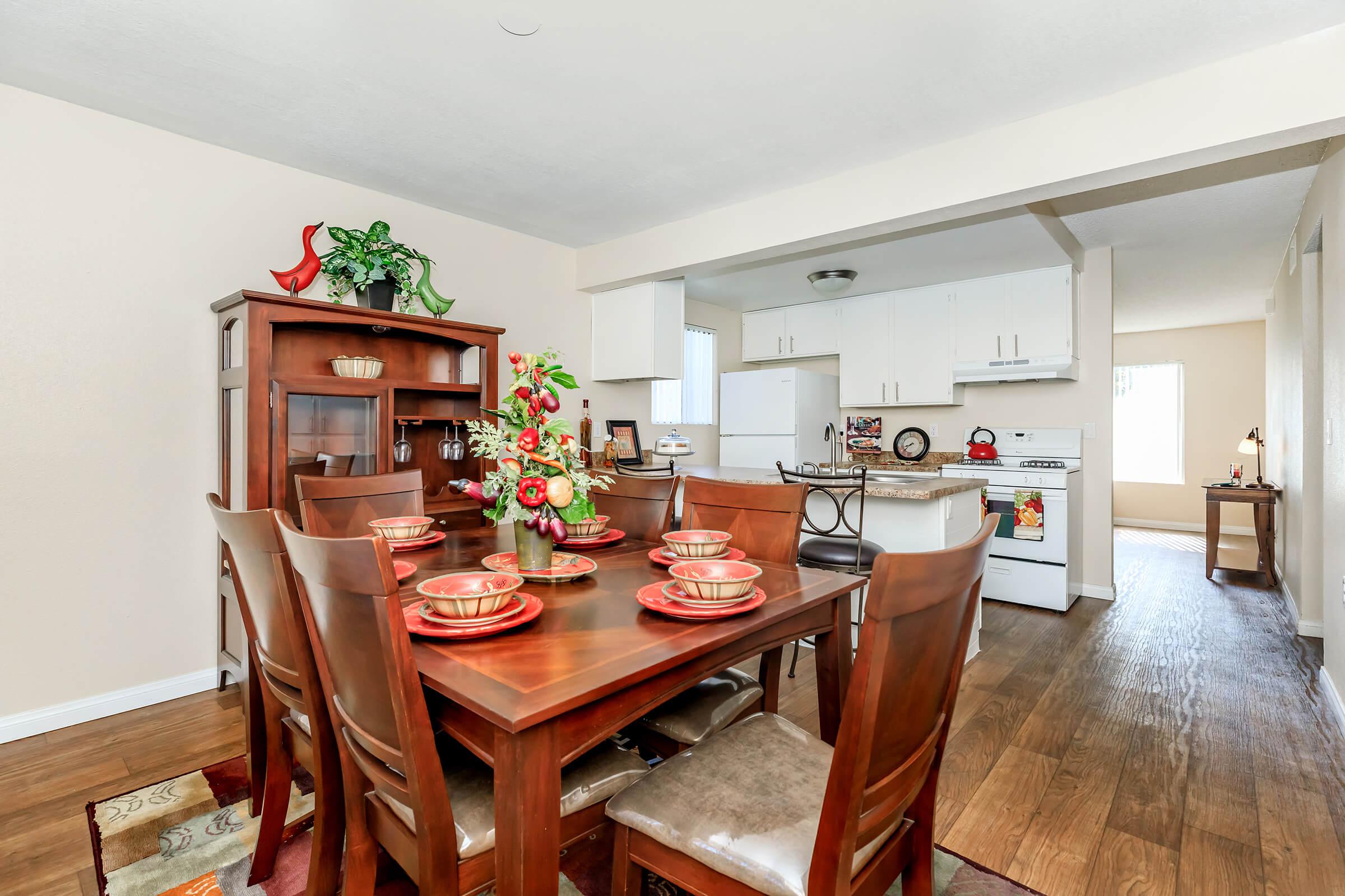 a kitchen with a dining room table