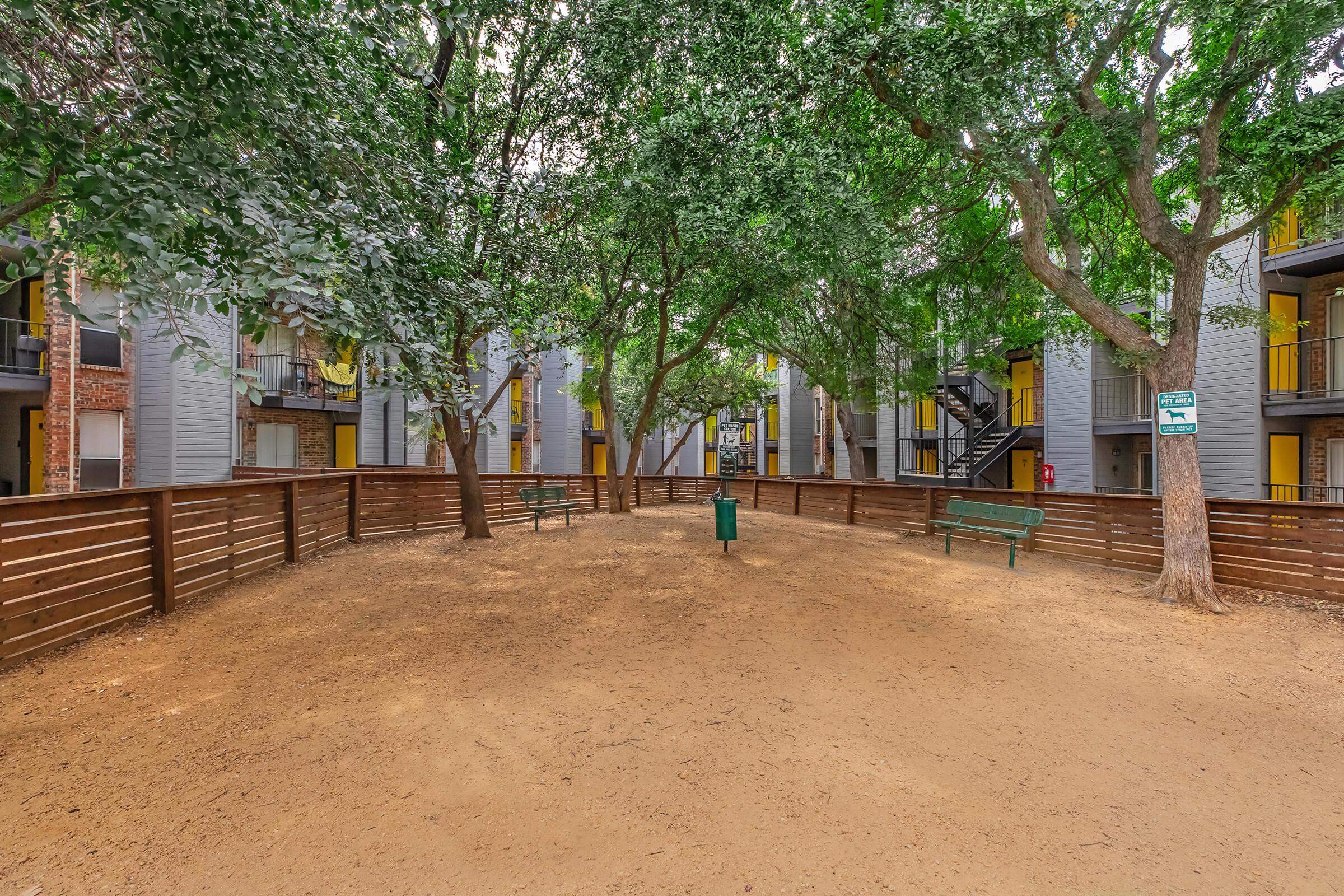 a tree in front of a house