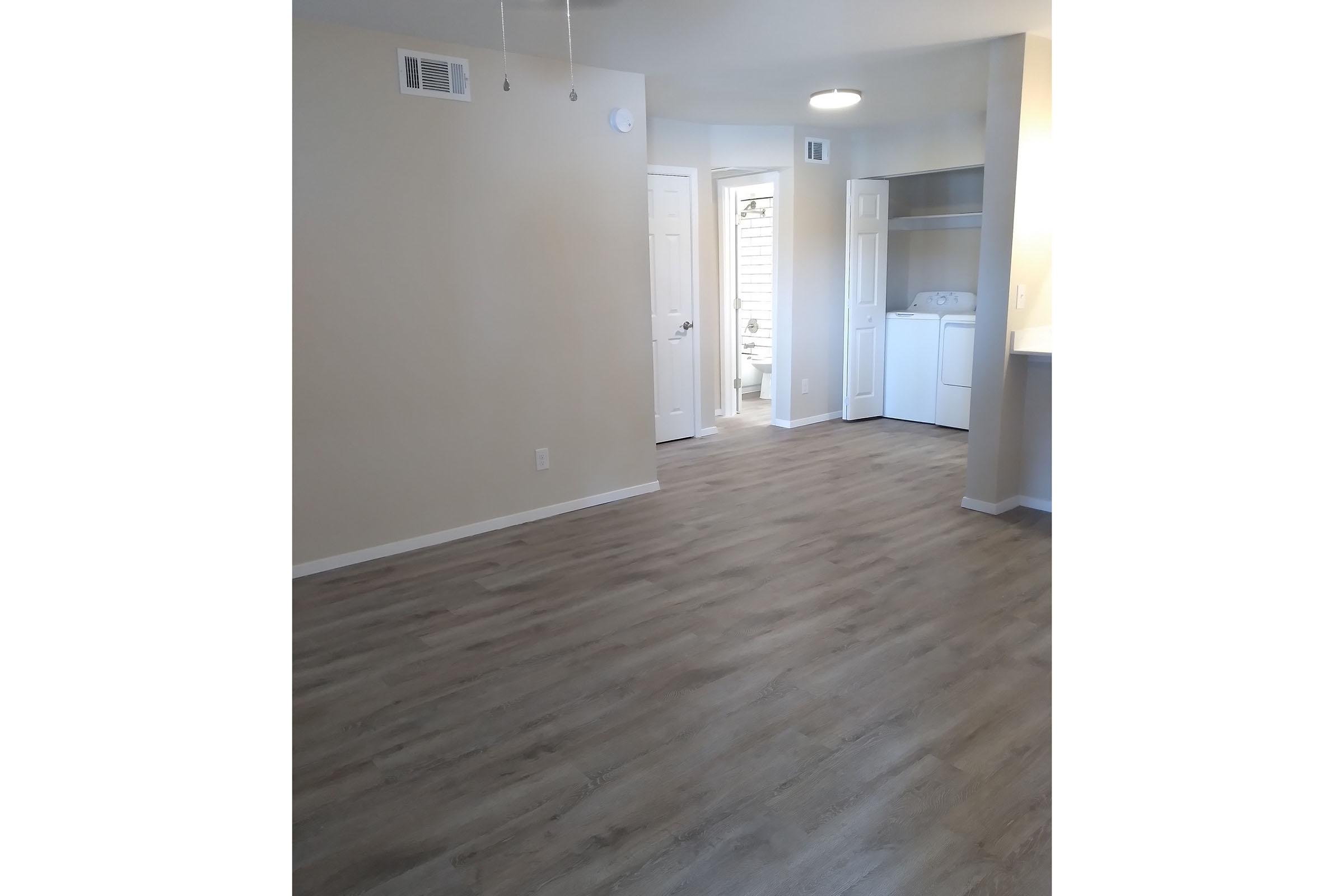 vacant apartment with wooden floors