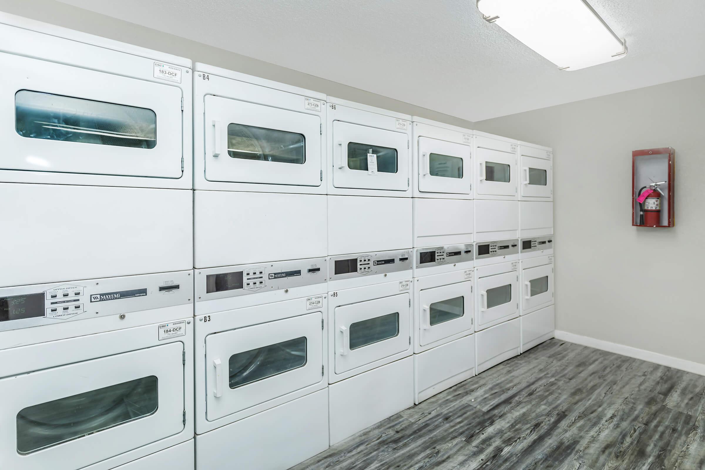Community laundry facility washer and dryers at Rise Camelback in Glendale
