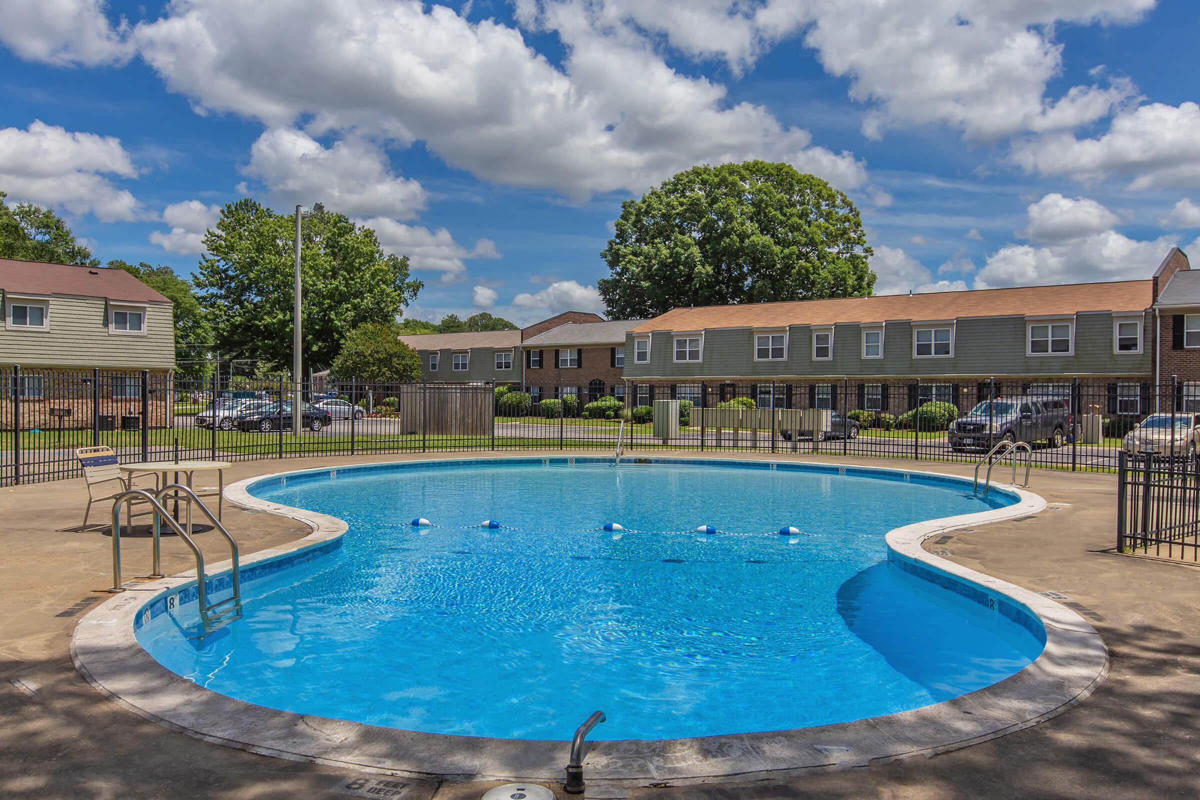 a pool next to a body of water