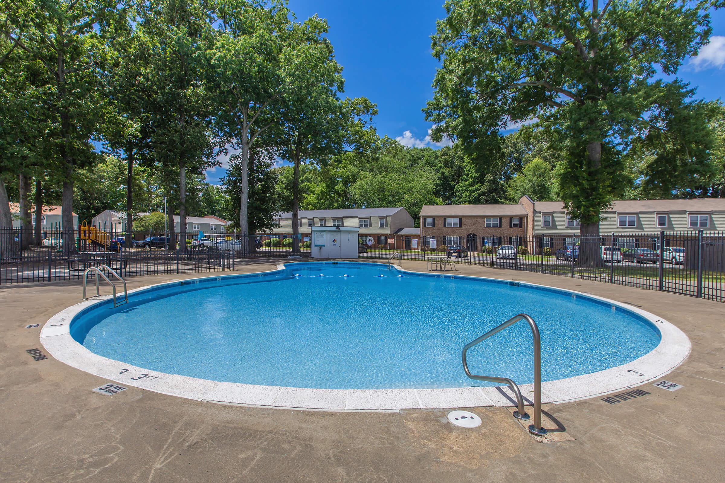 a pool next to a body of water