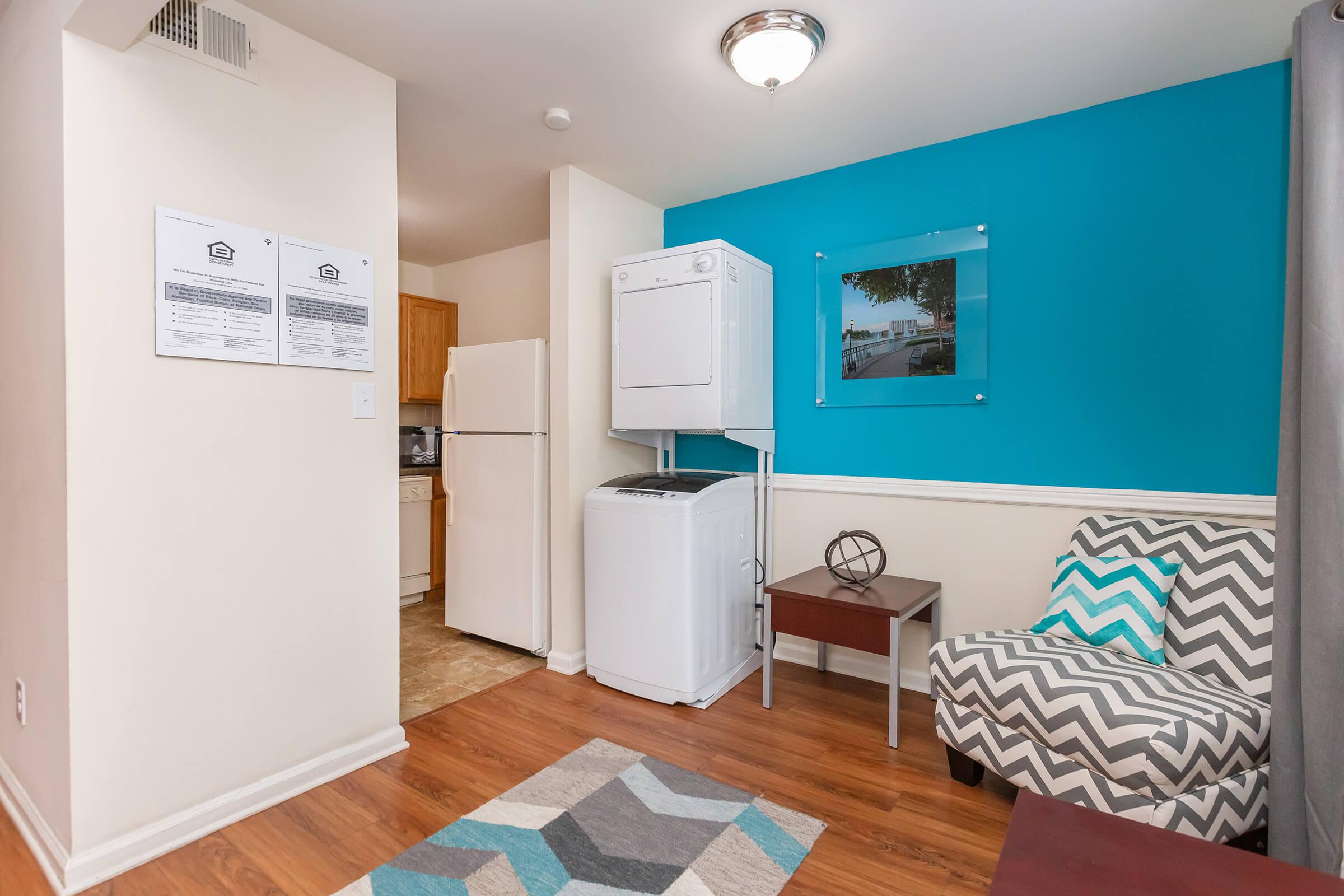 a white refrigerator freezer sitting in a room