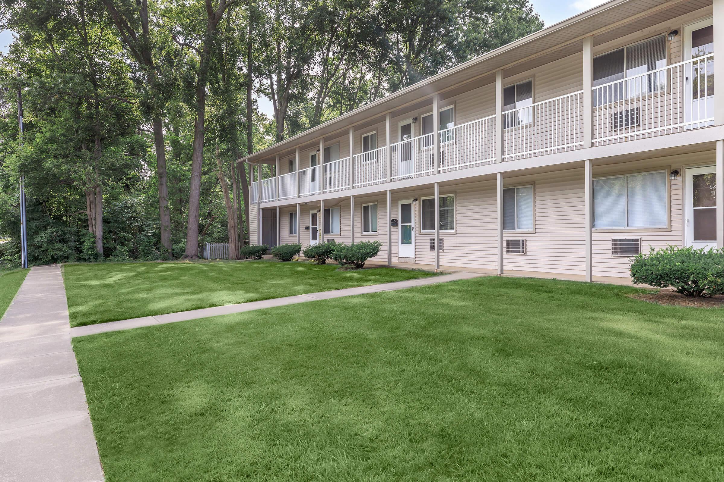 a large lawn in front of a house