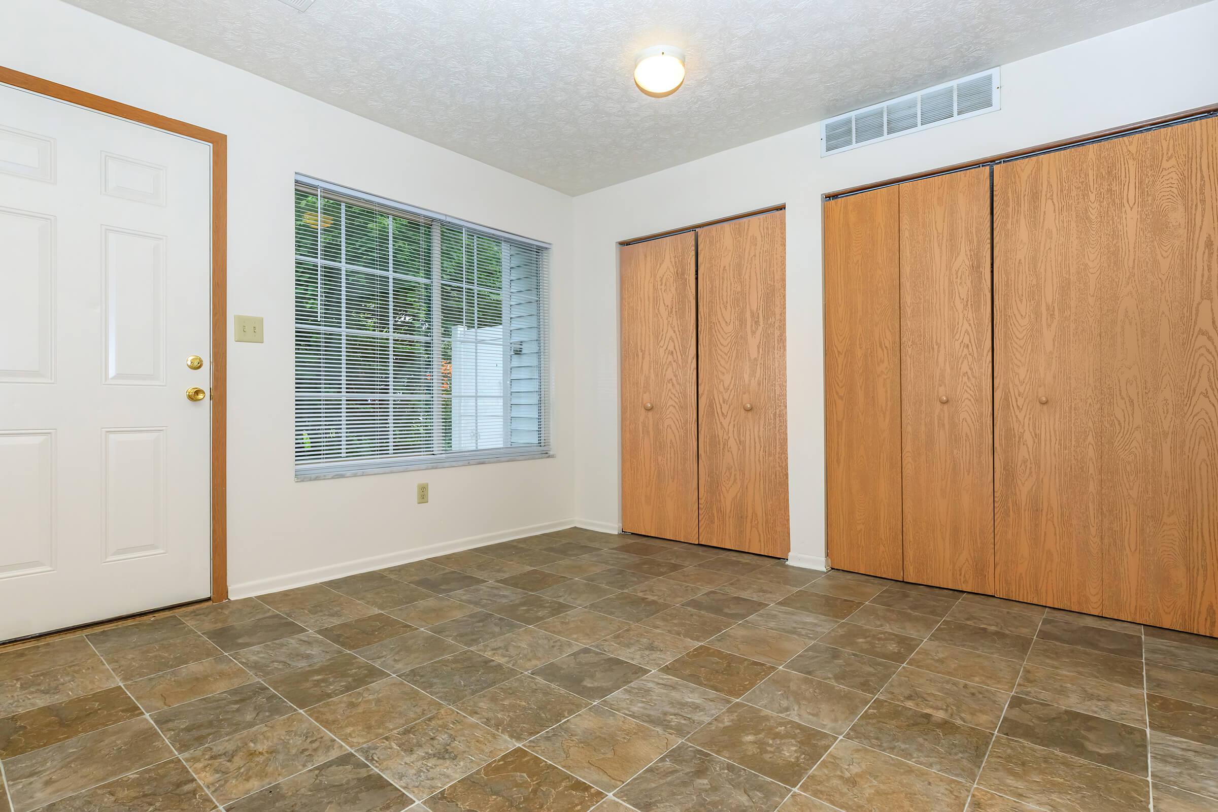 a kitchen with a wooden floor
