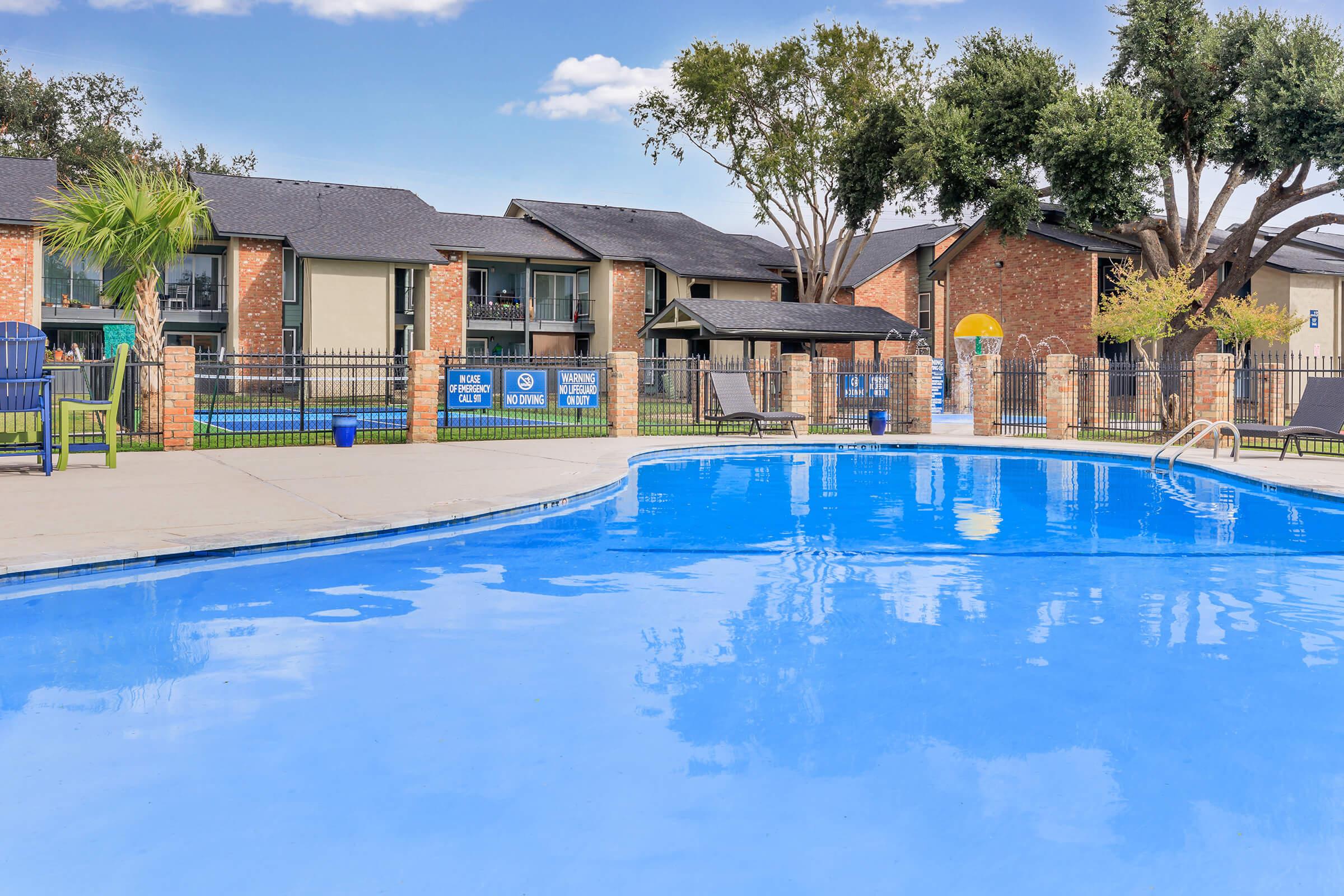 a house with a large pool of water