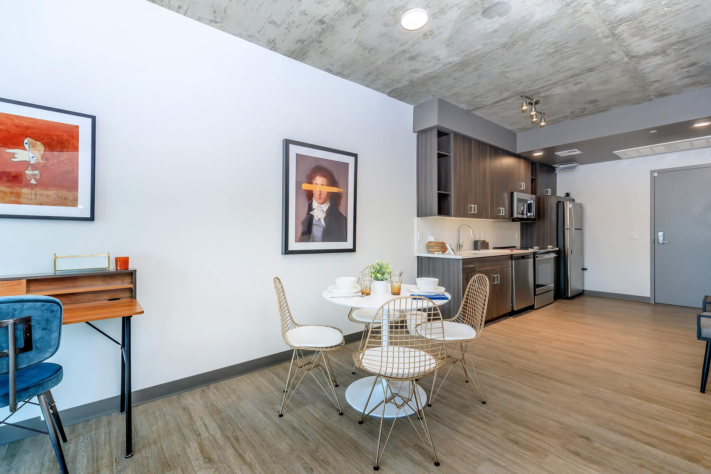 a room filled with furniture and a table