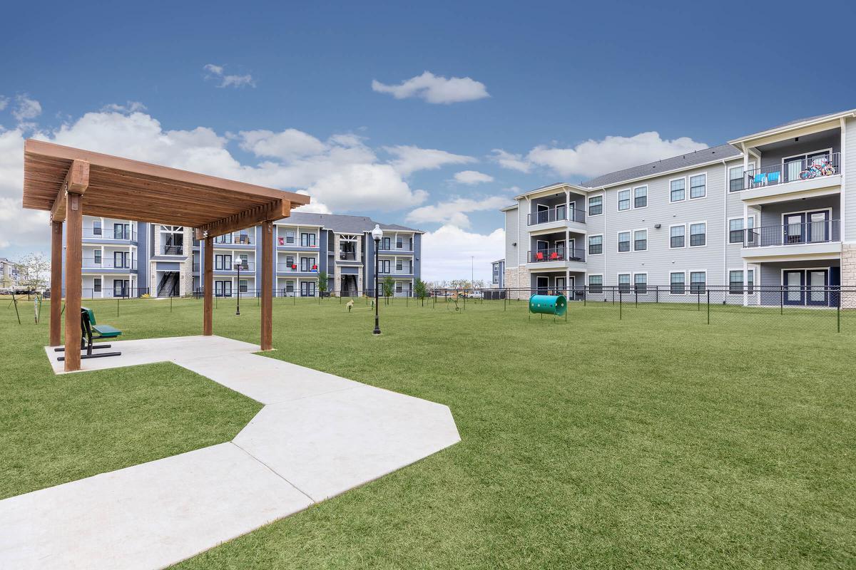 a large lawn in front of a building