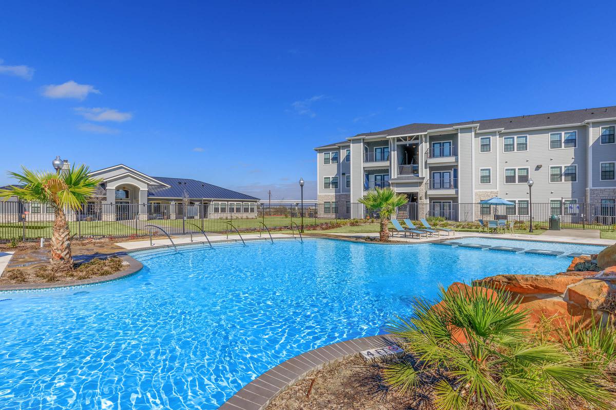 a pool next to a body of water