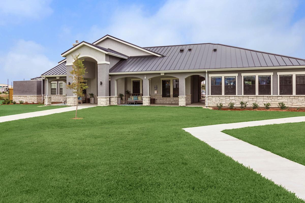 a large lawn in front of a house