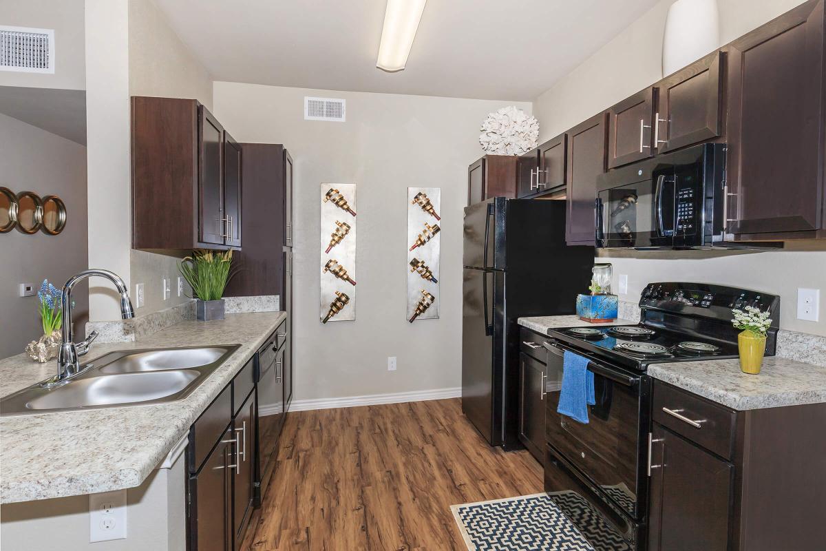 a modern kitchen with stainless steel appliances