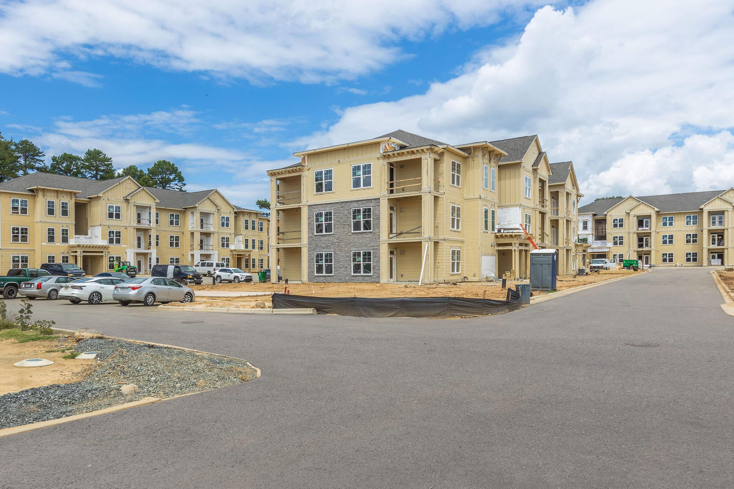 a large building in the middle of a road