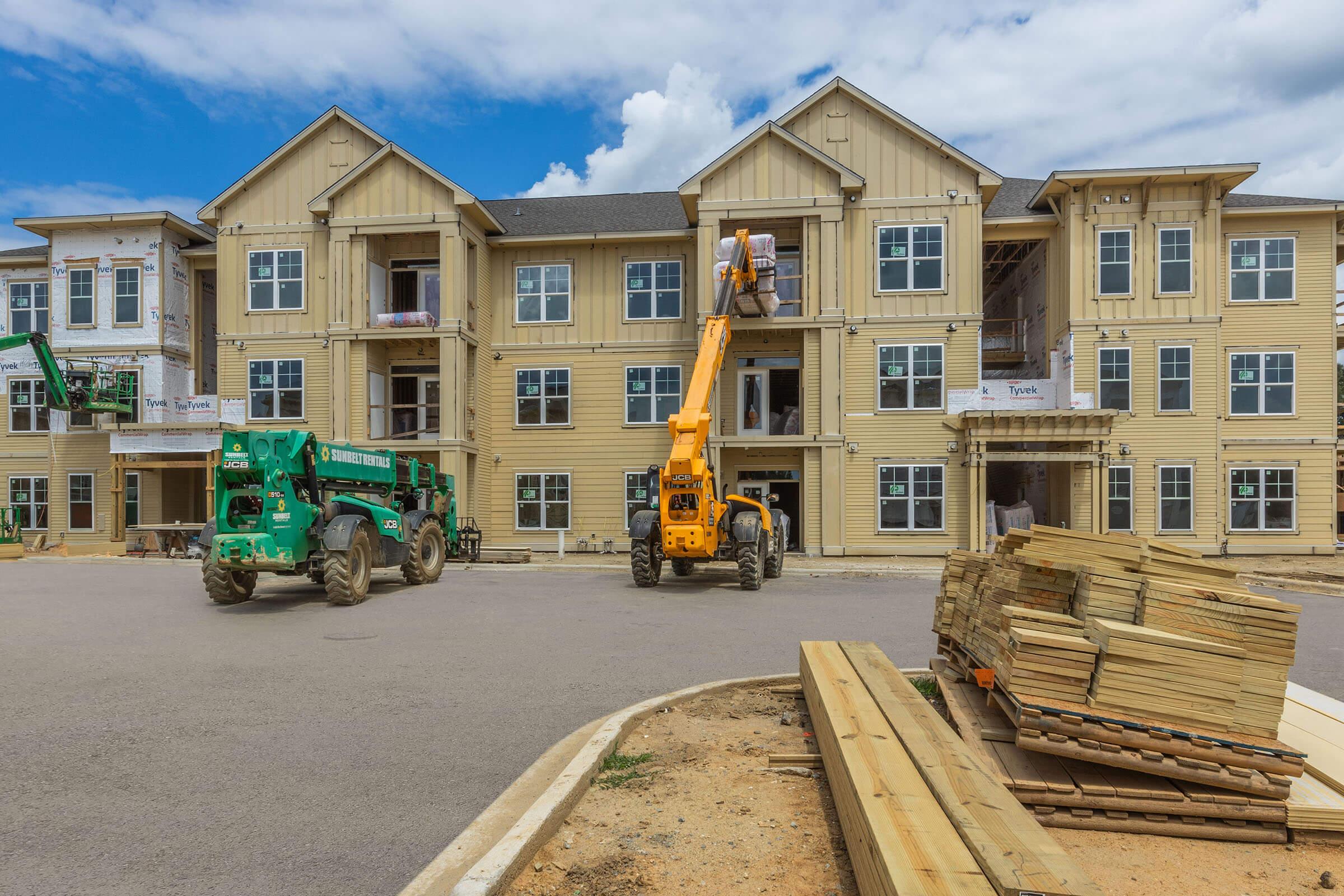 a truck is parked in front of a building