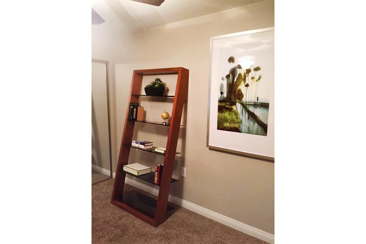 Bedroom with wooden bookshelf