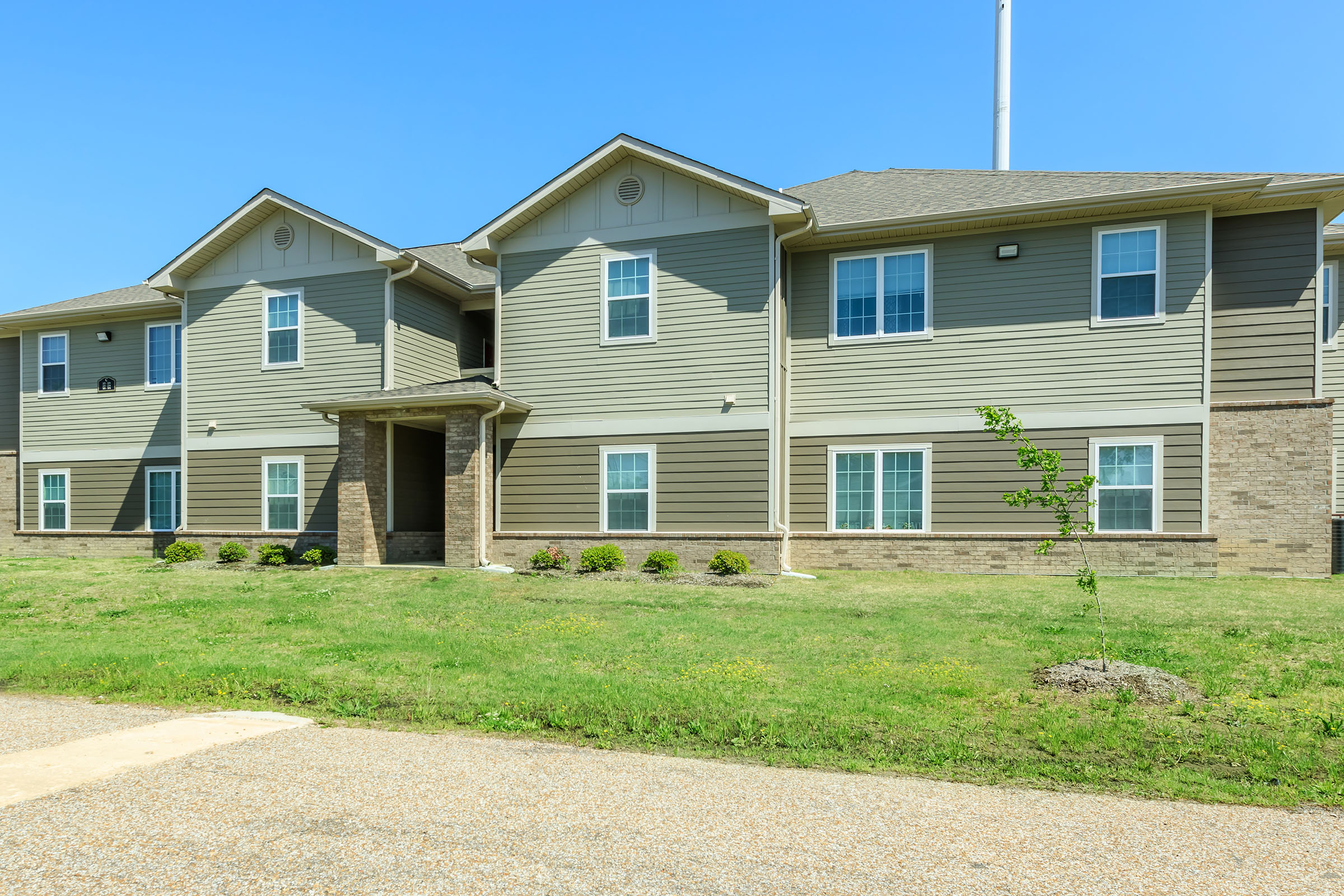 a large lawn in front of a house