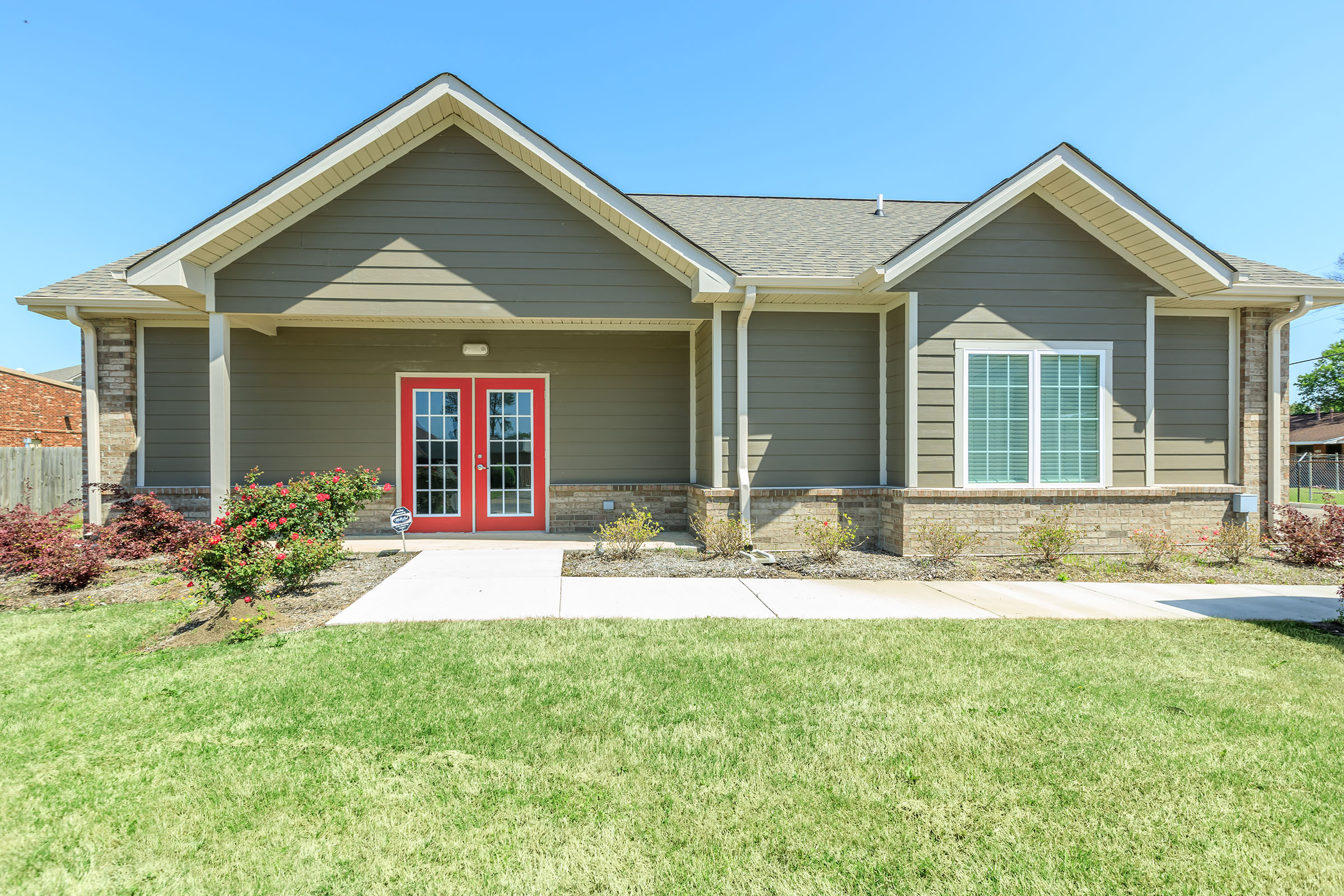 a large lawn in front of a house