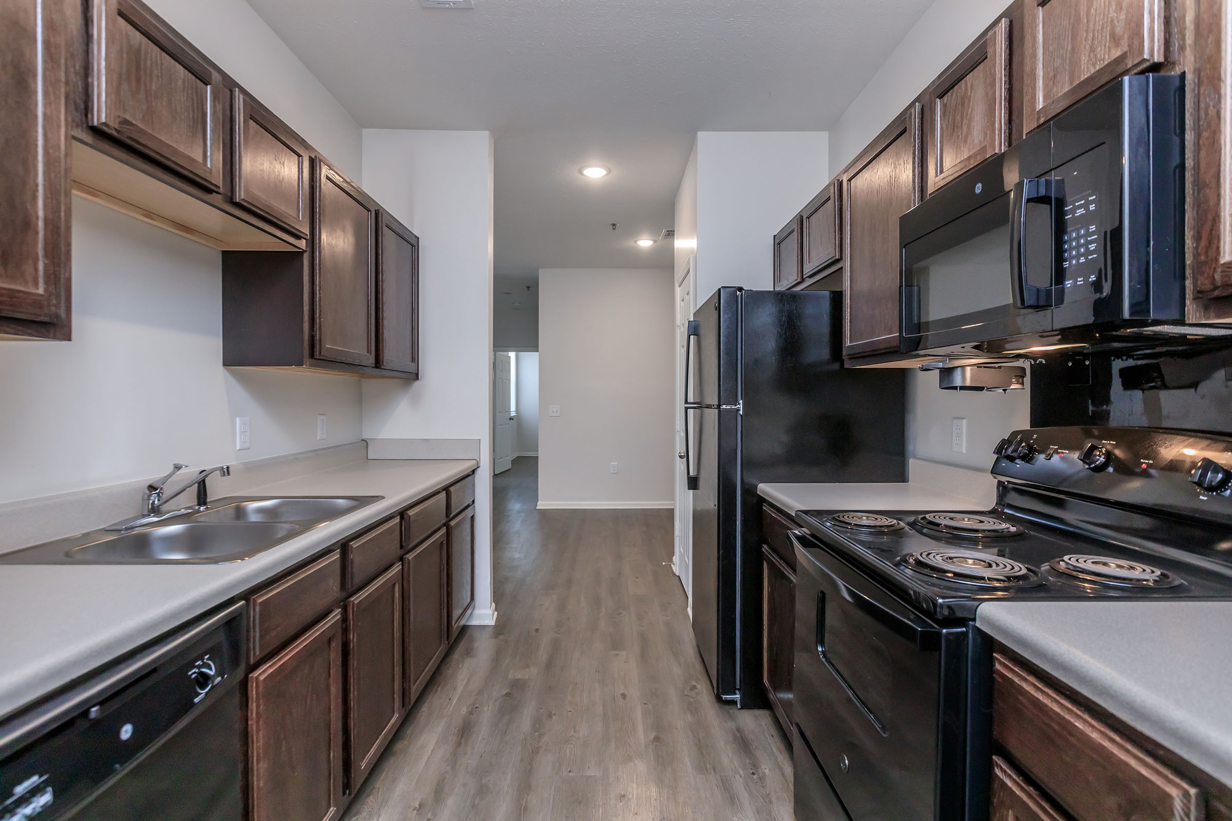 a large kitchen with stainless steel appliances