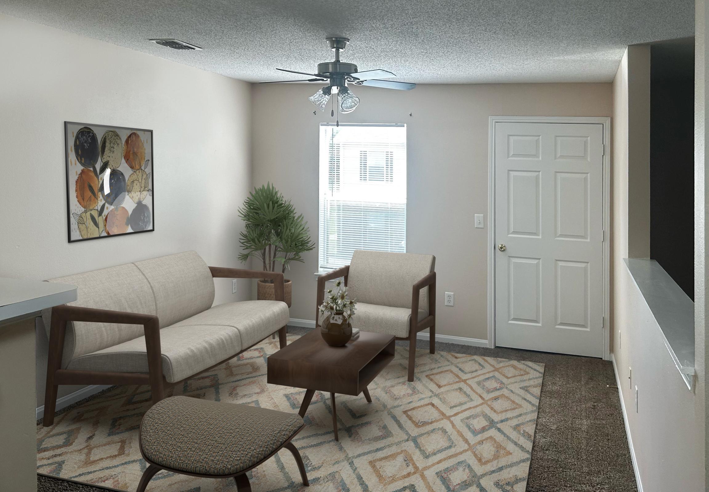 A cozy living room featuring a light-colored sofa and two matching armchairs, a wooden coffee table, and a decorative rug. There is a plant in the corner and a ceiling fan above. Natural light filters in through a window beside a door, and art is displayed on the wall. The space has a warm, inviting atmosphere.