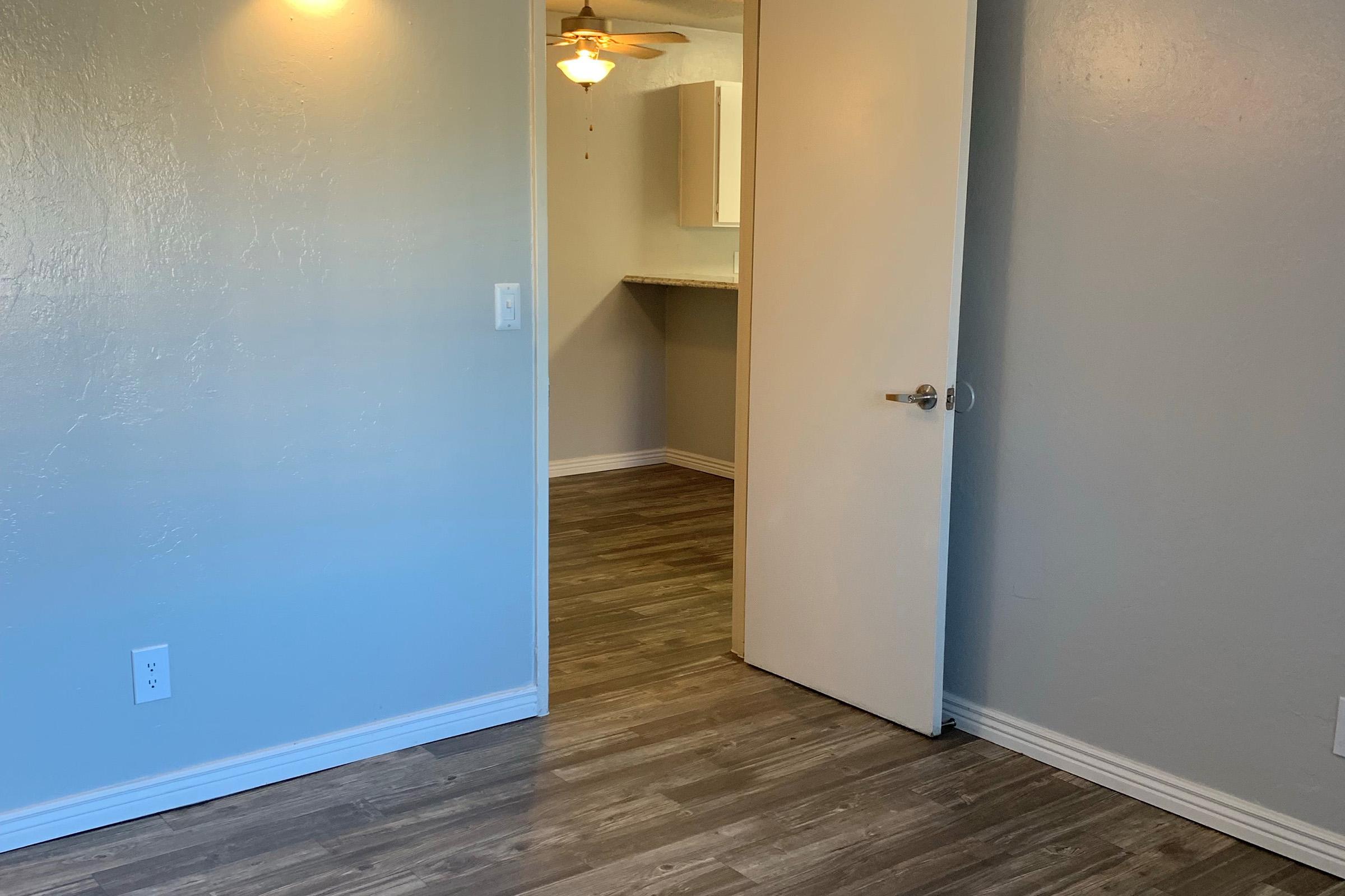 a white refrigerator freezer sitting in a room