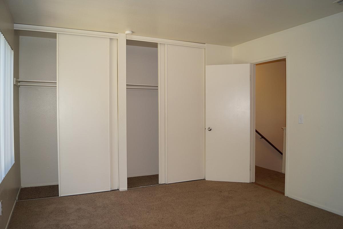 a white refrigerator freezer sitting in a room