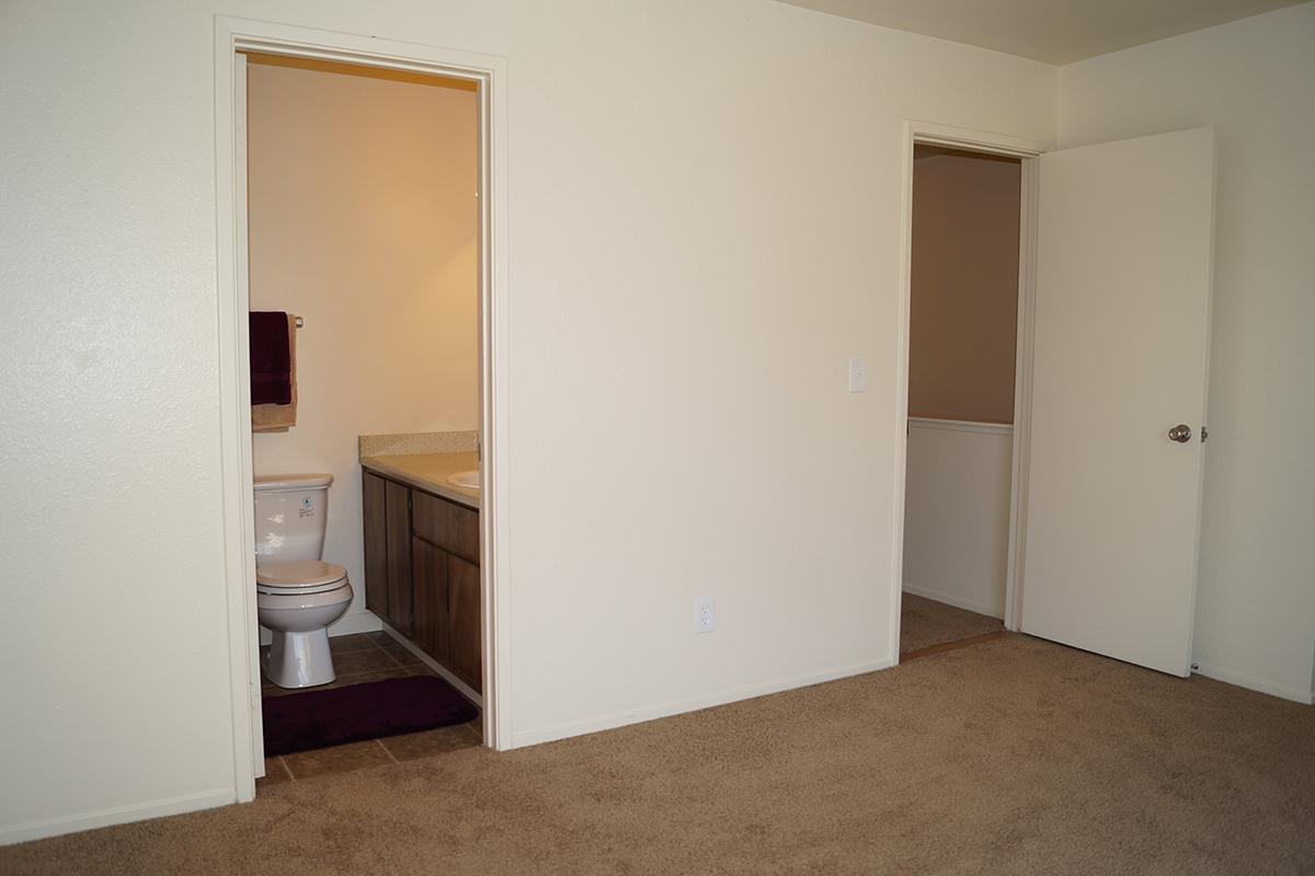 a white refrigerator freezer sitting in a room