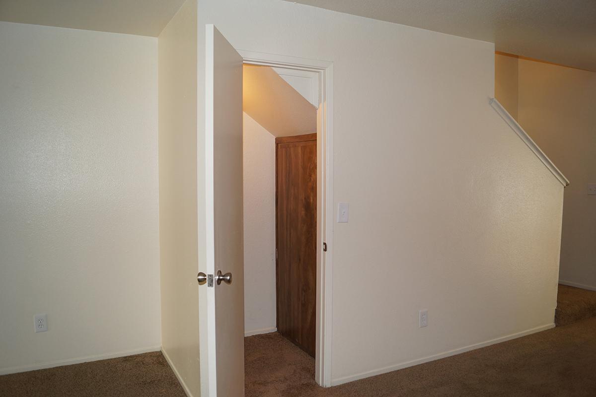 a white refrigerator freezer sitting in a room