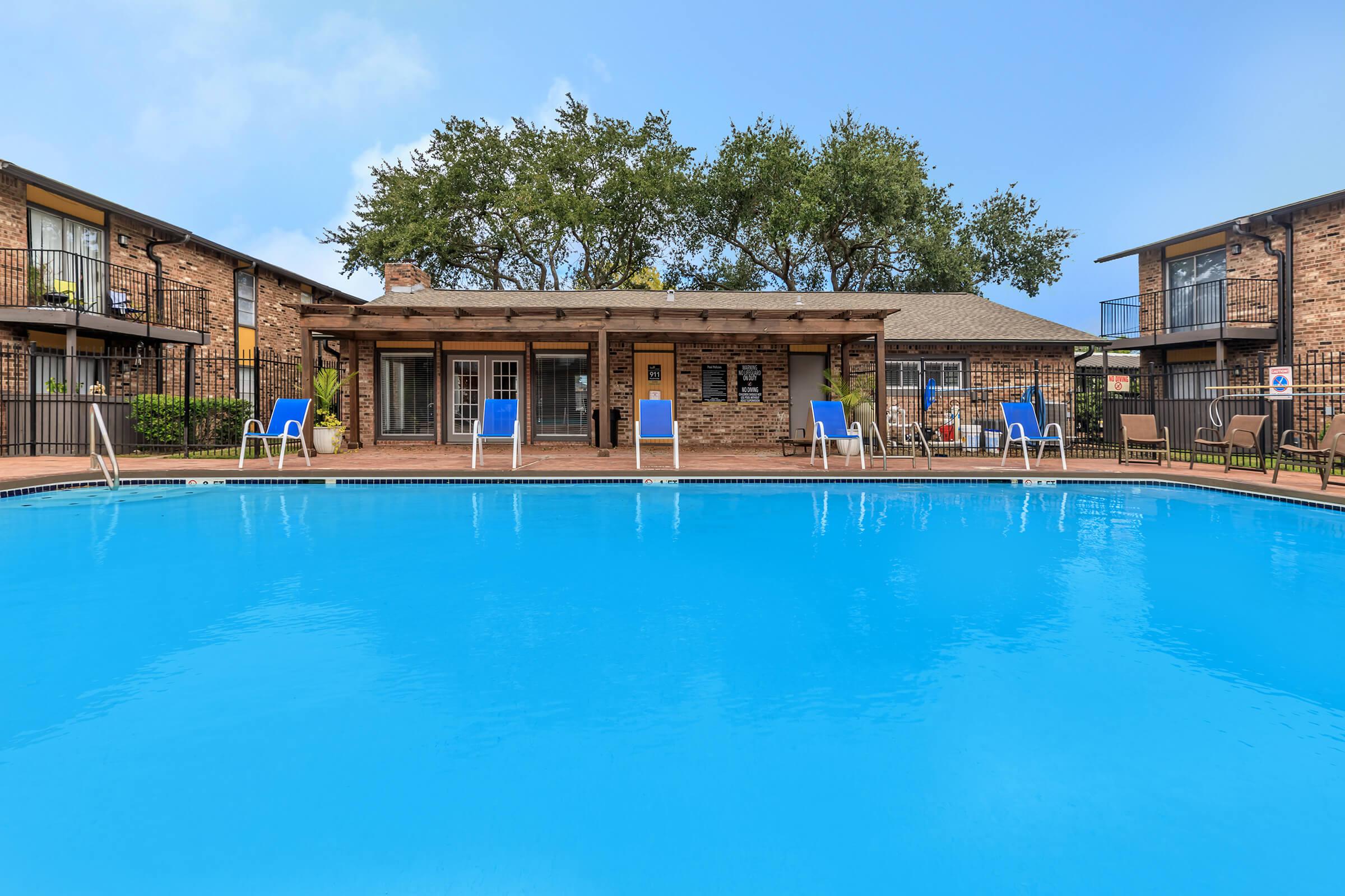 a house with a large pool of water