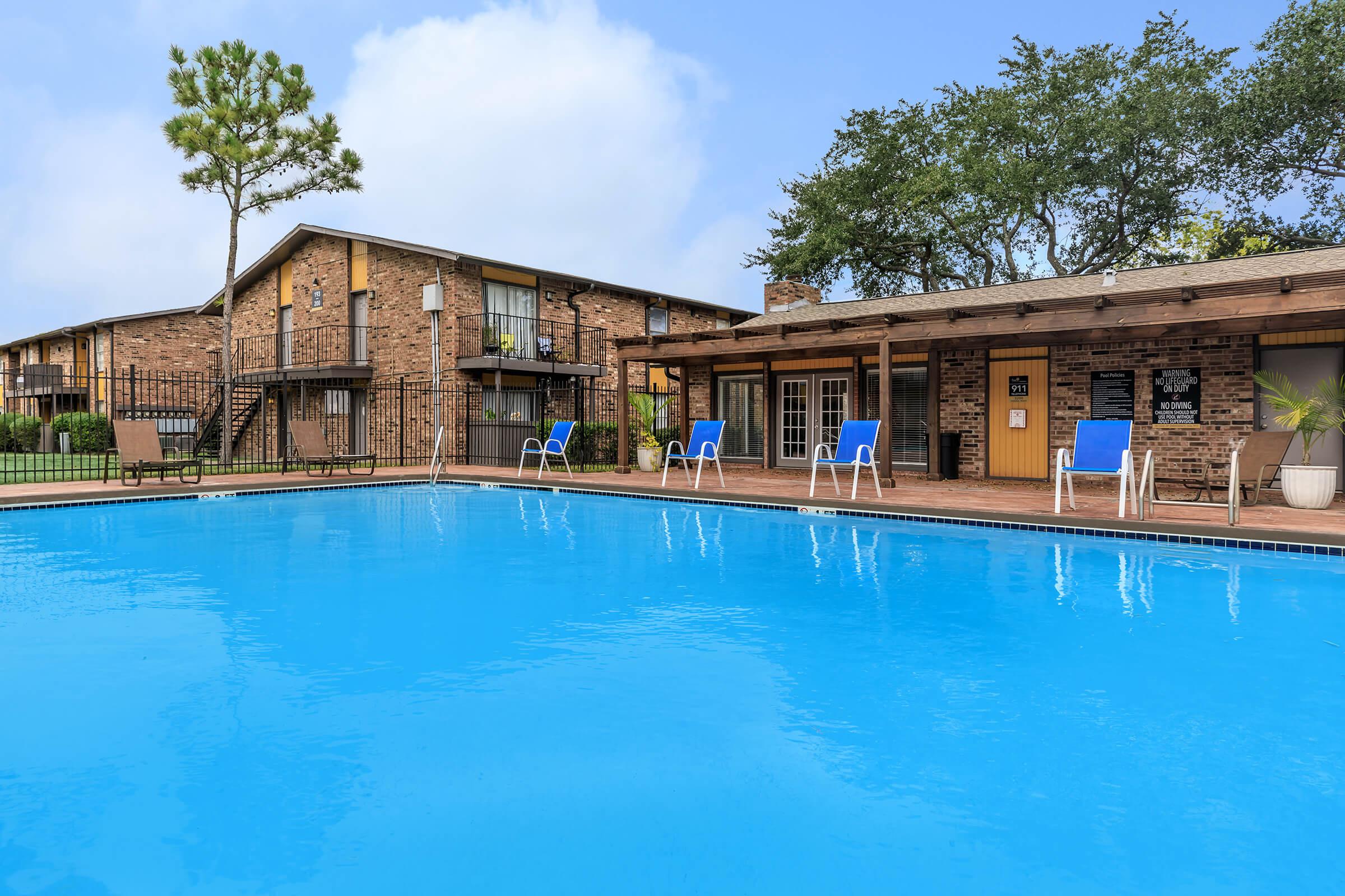 a house with a large pool of water