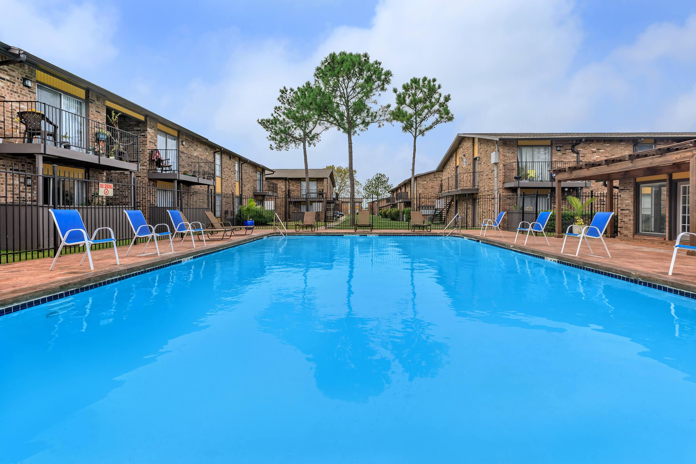 a house with a large pool of water