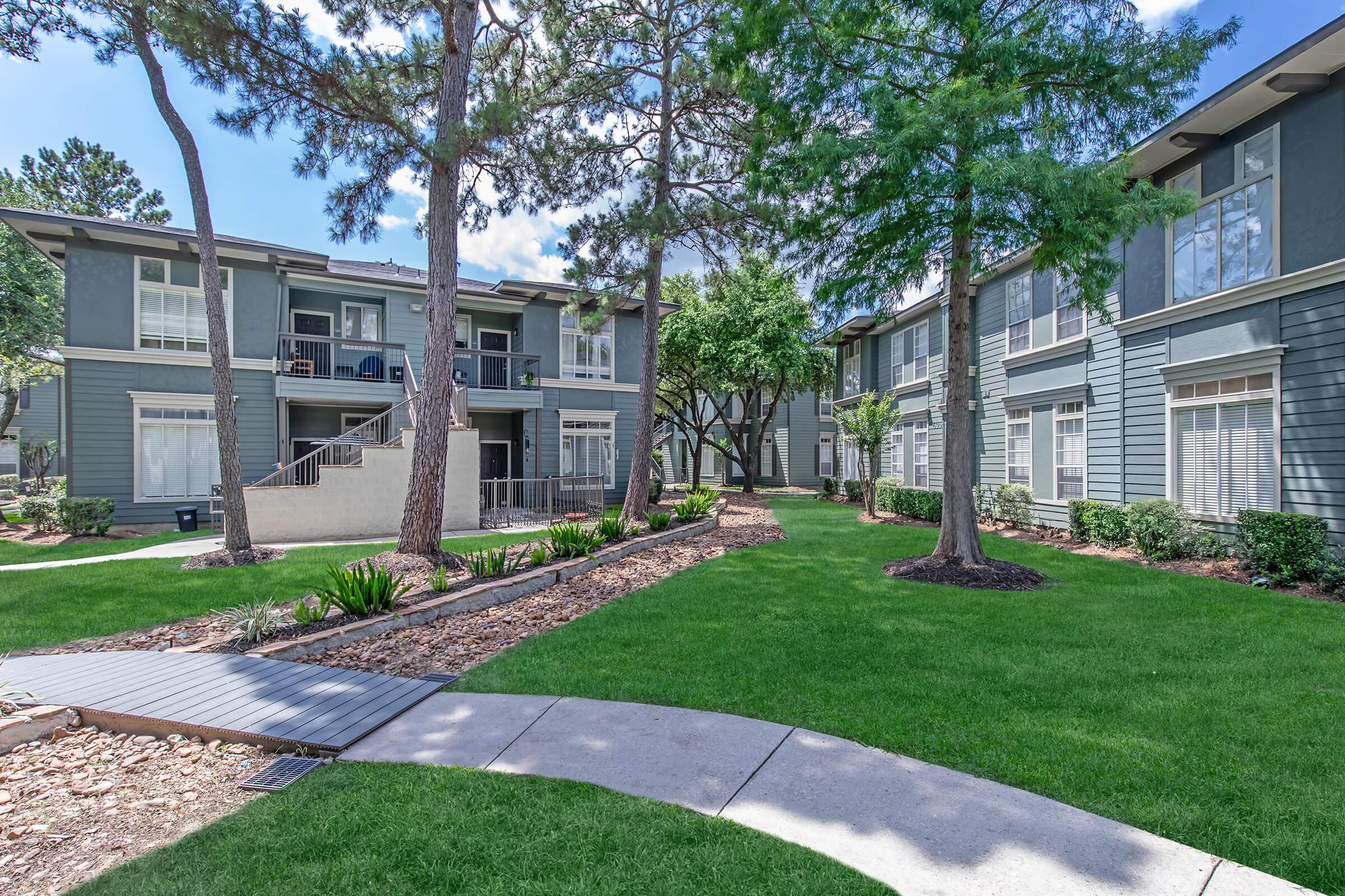 a large lawn in front of a house