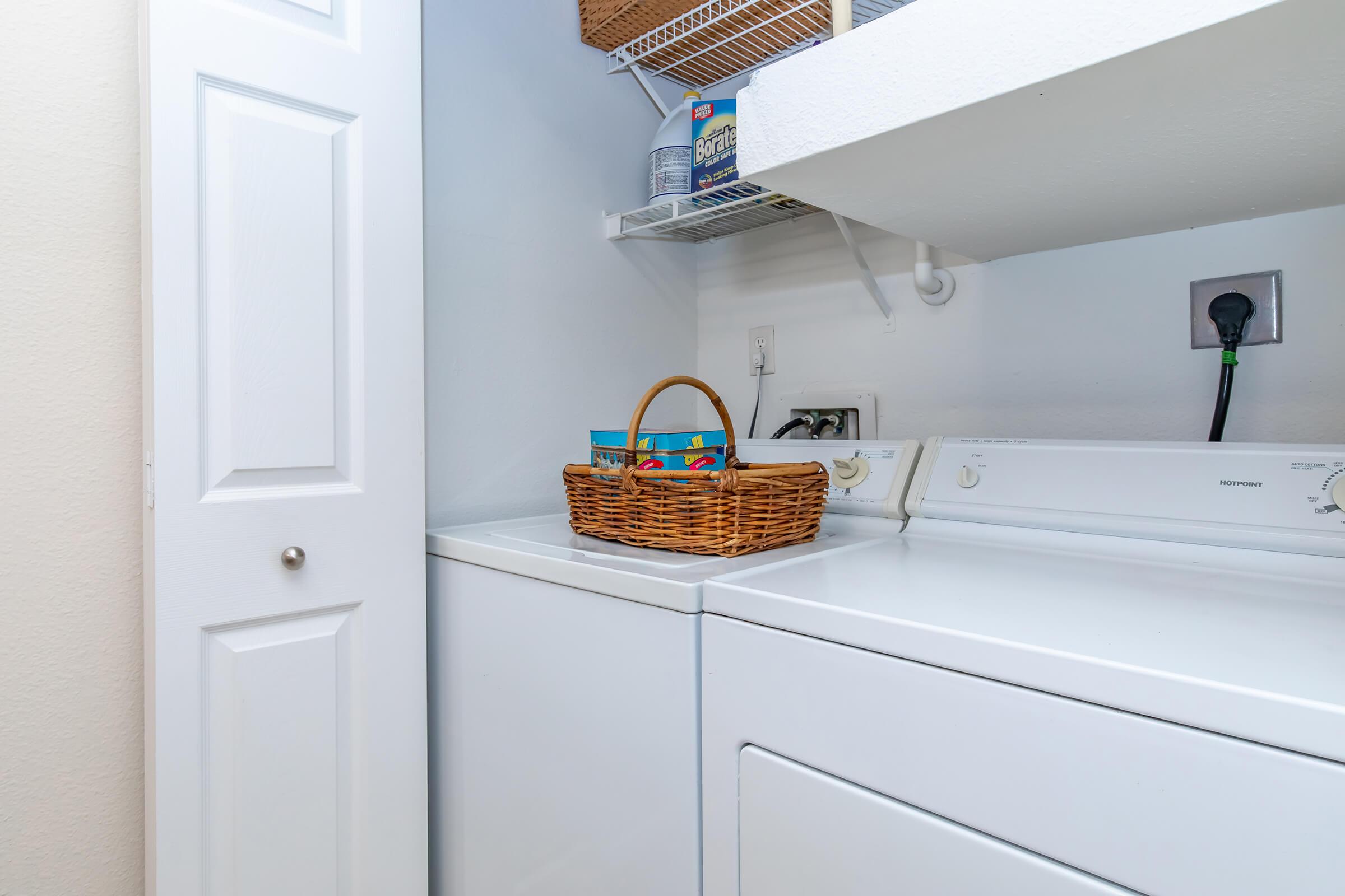 a kitchen with a sink and a microwave