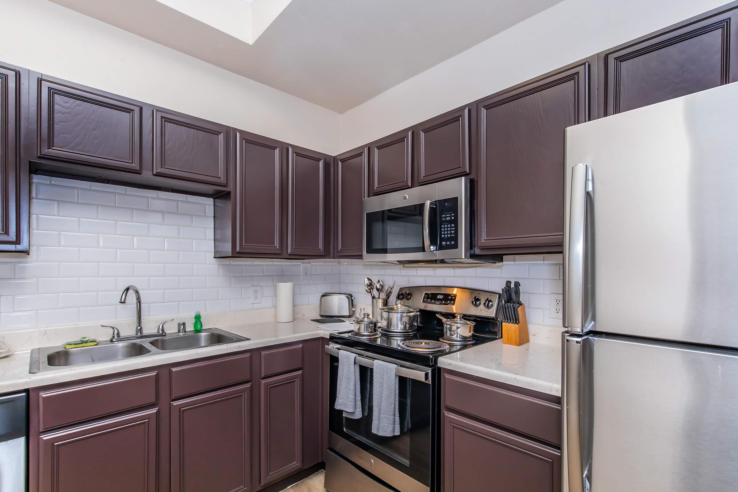 a kitchen with stainless steel appliances