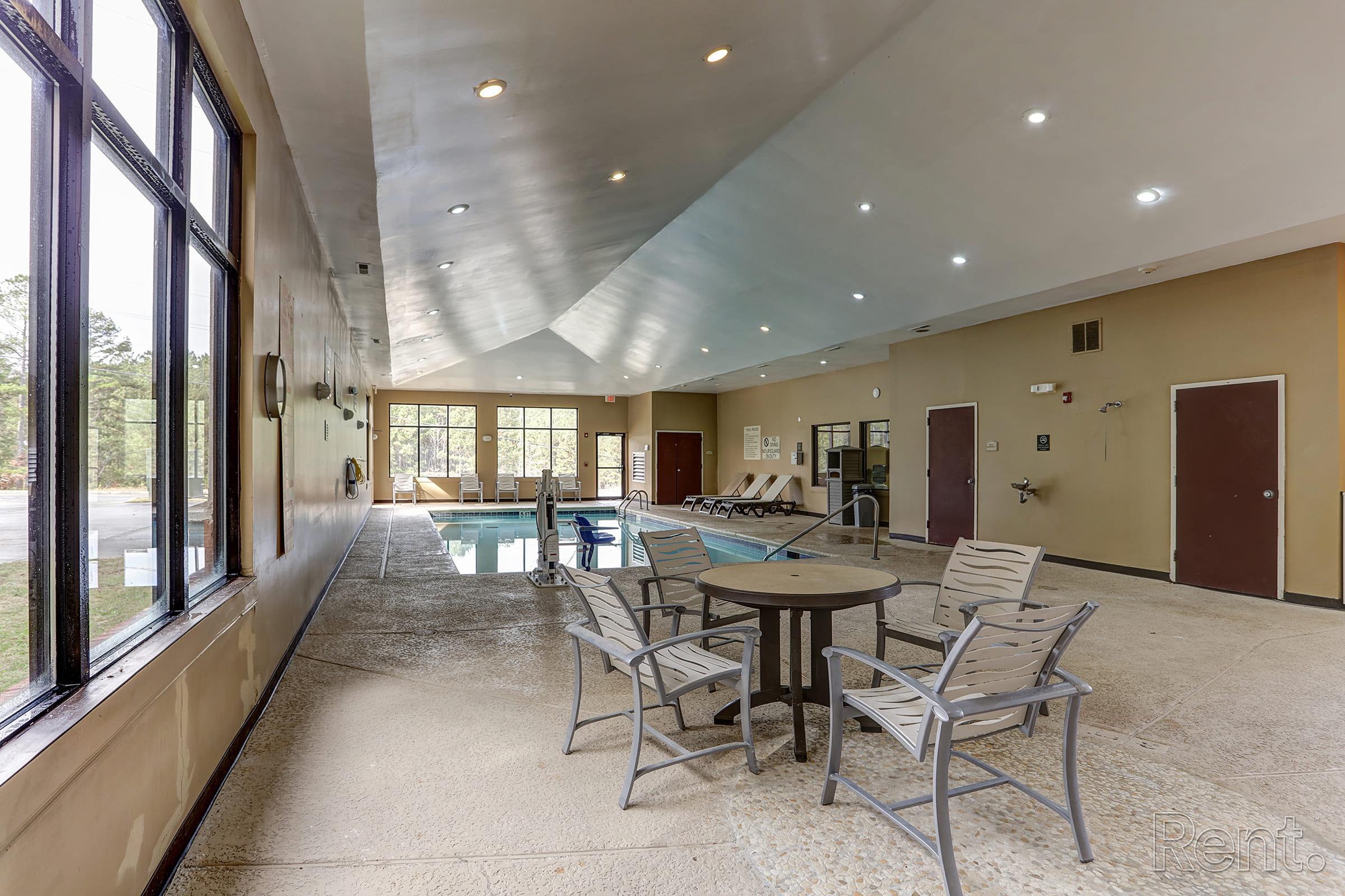 a large room with tables and chairs