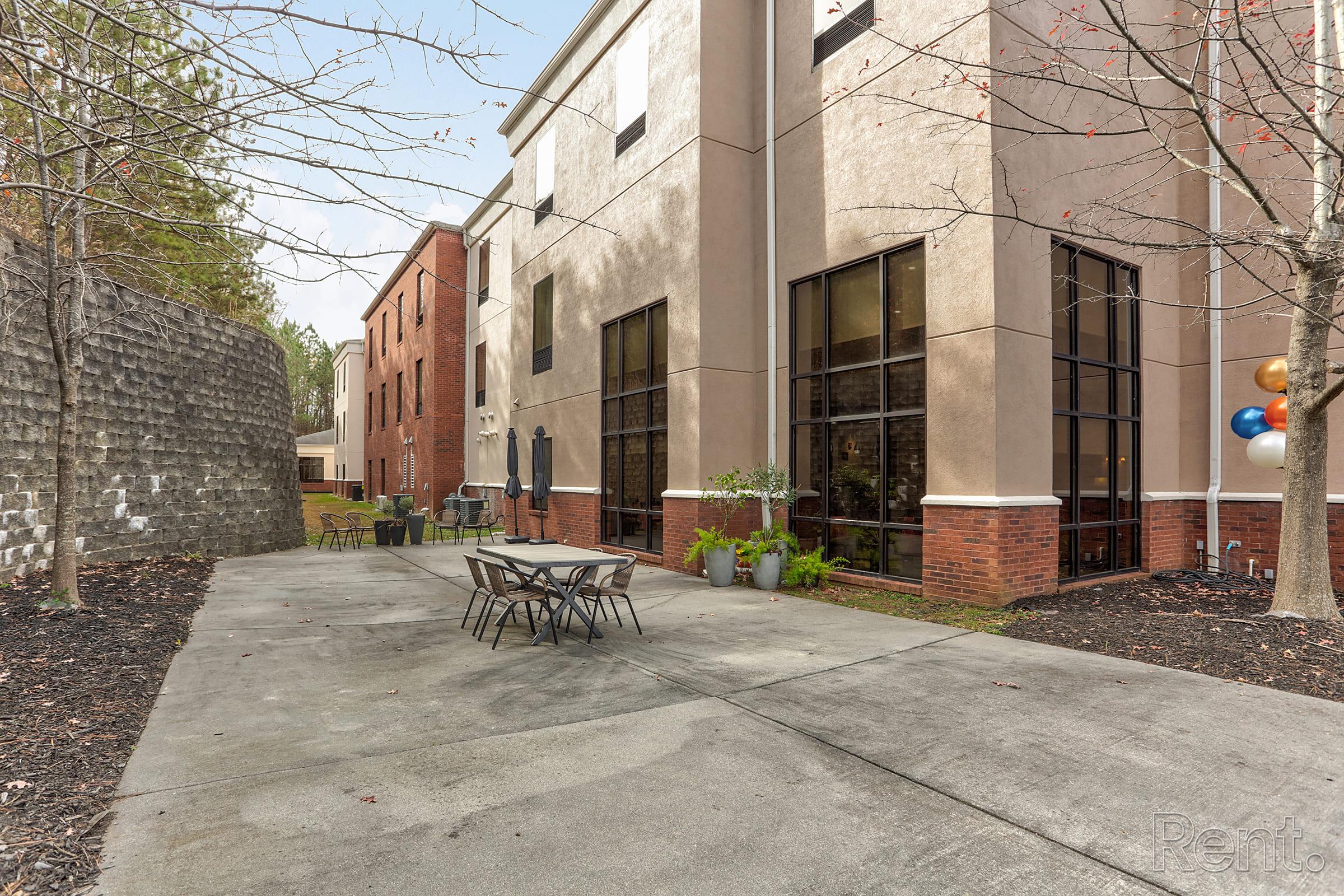 a close up of a street in front of a brick building