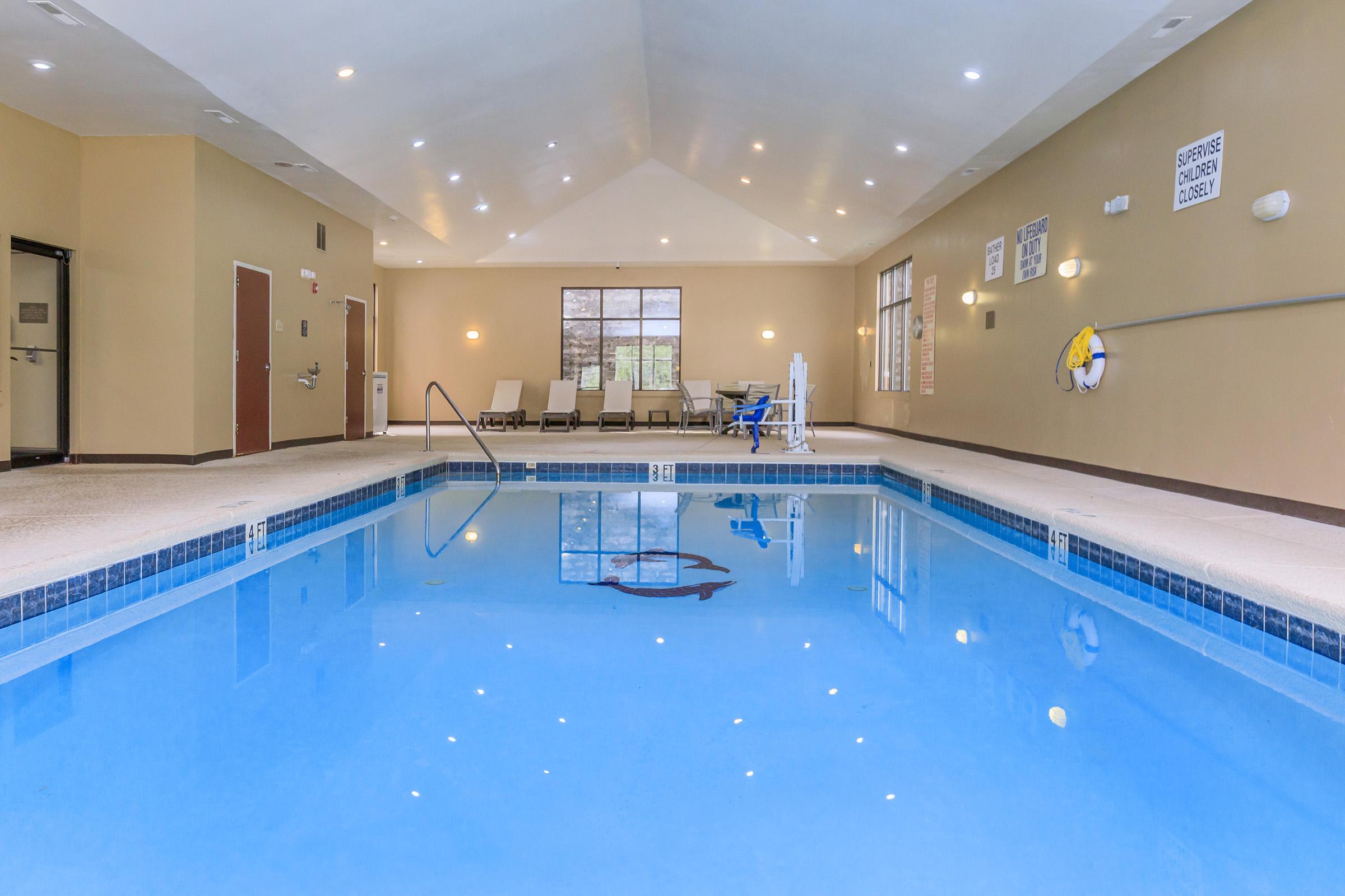 a kitchen with a blue pool of water