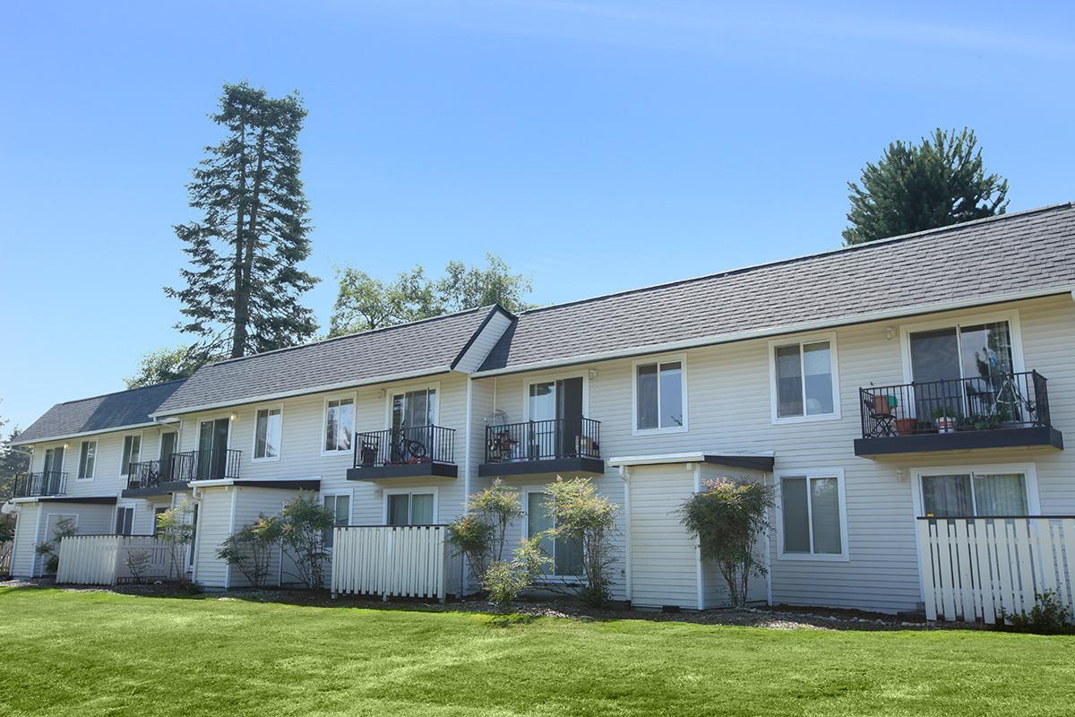 a large lawn in front of a house