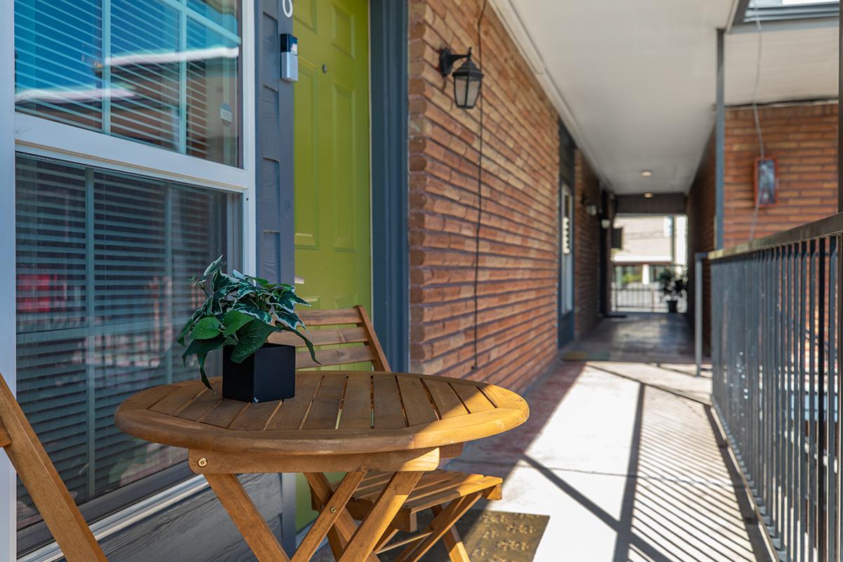 a chair sitting in front of a building