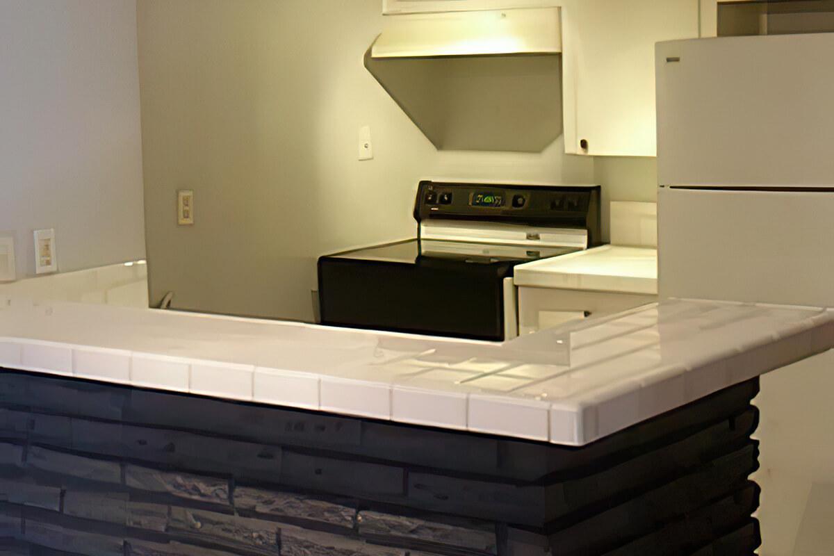 a kitchen with a sink and a microwave