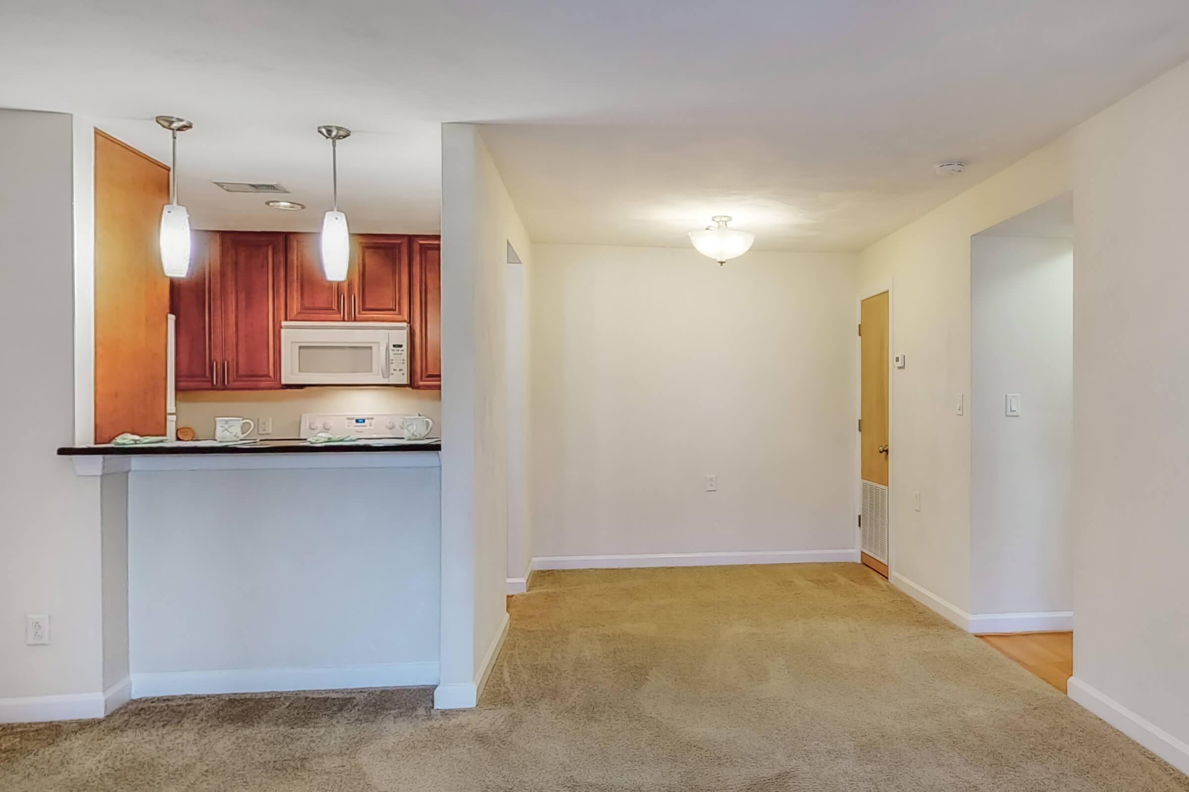 a kitchen with a wood floor