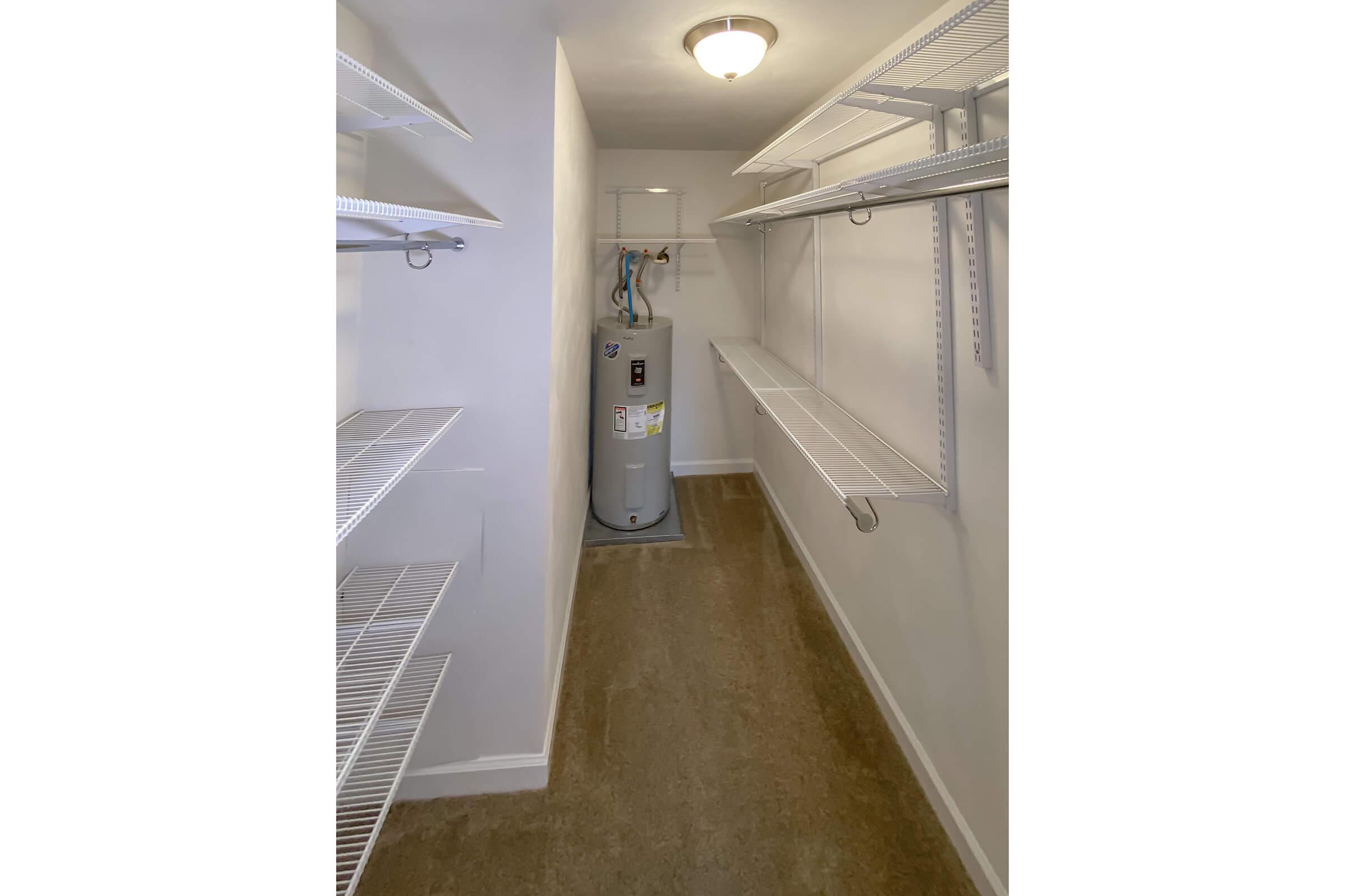 a refrigerator freezer sitting inside of a building