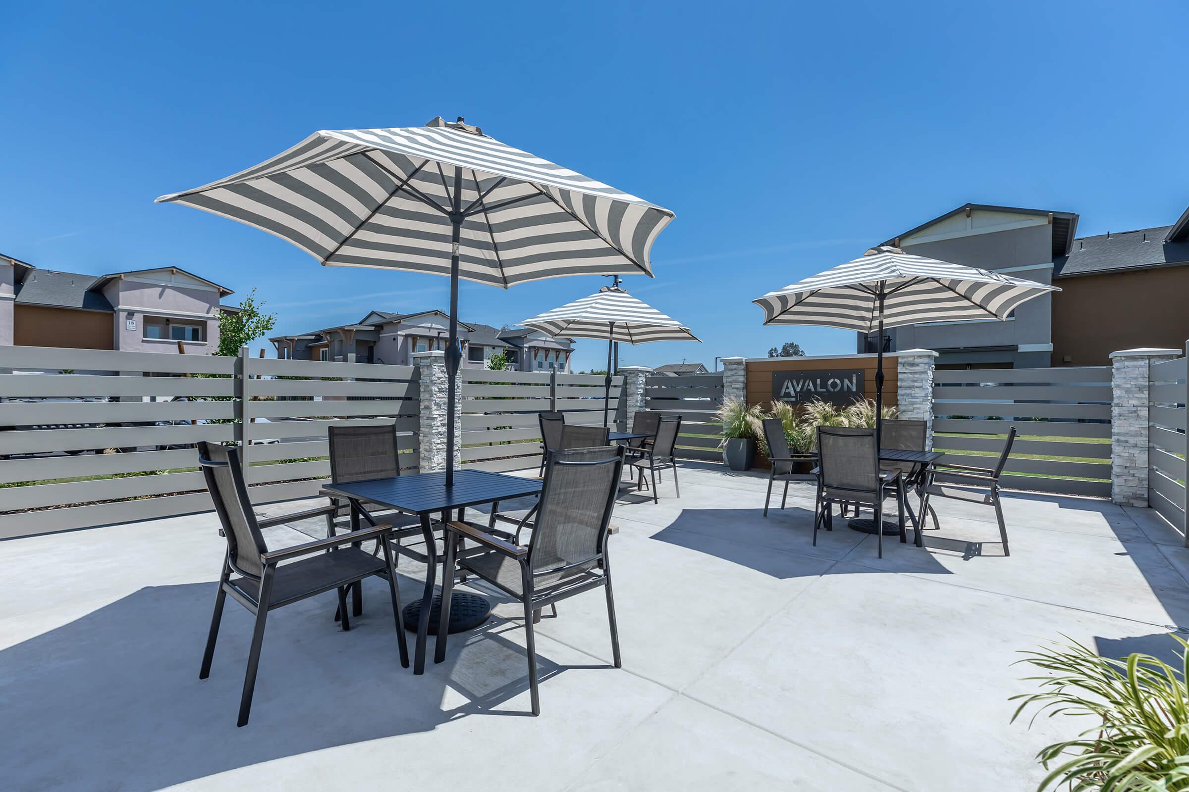 a group of lawn chairs sitting on top of a table