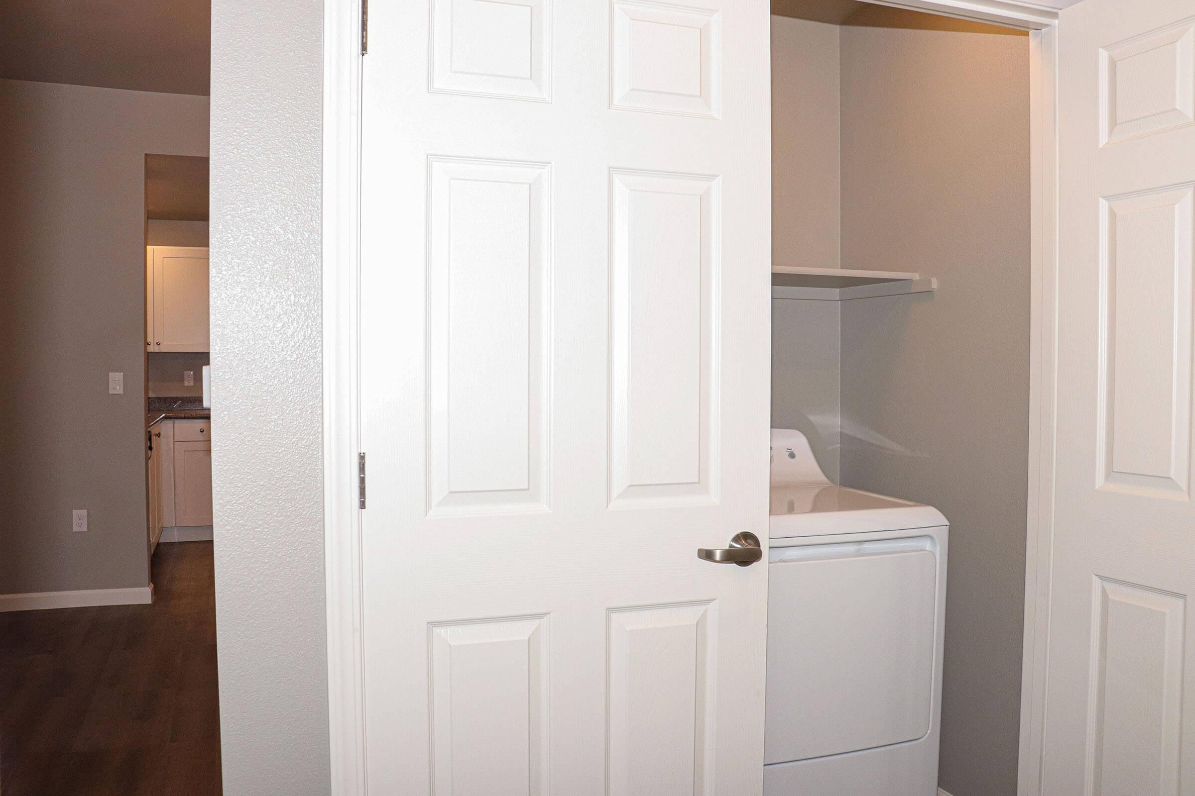 a kitchen with a sink and a refrigerator