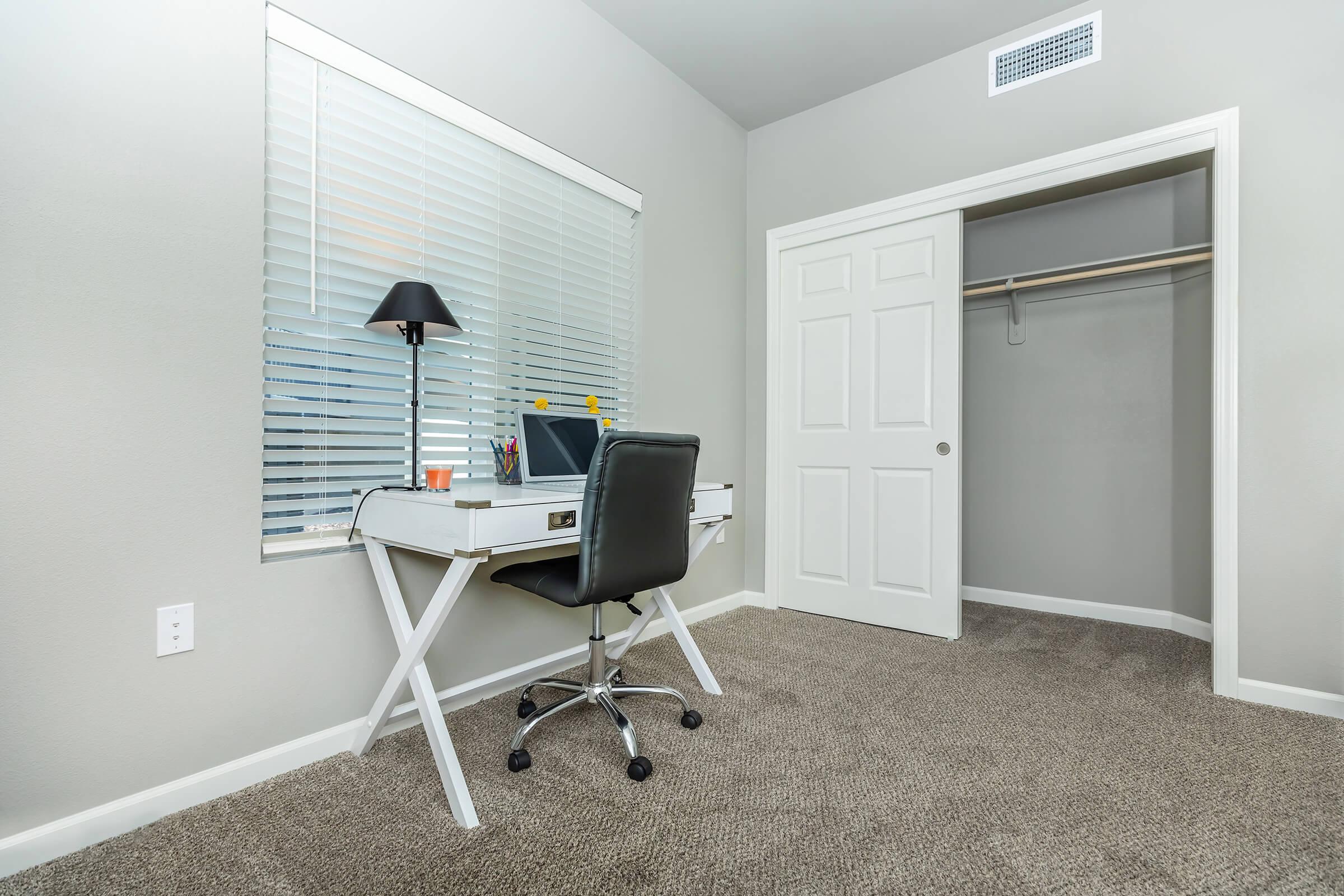 a chair sitting in front of a door